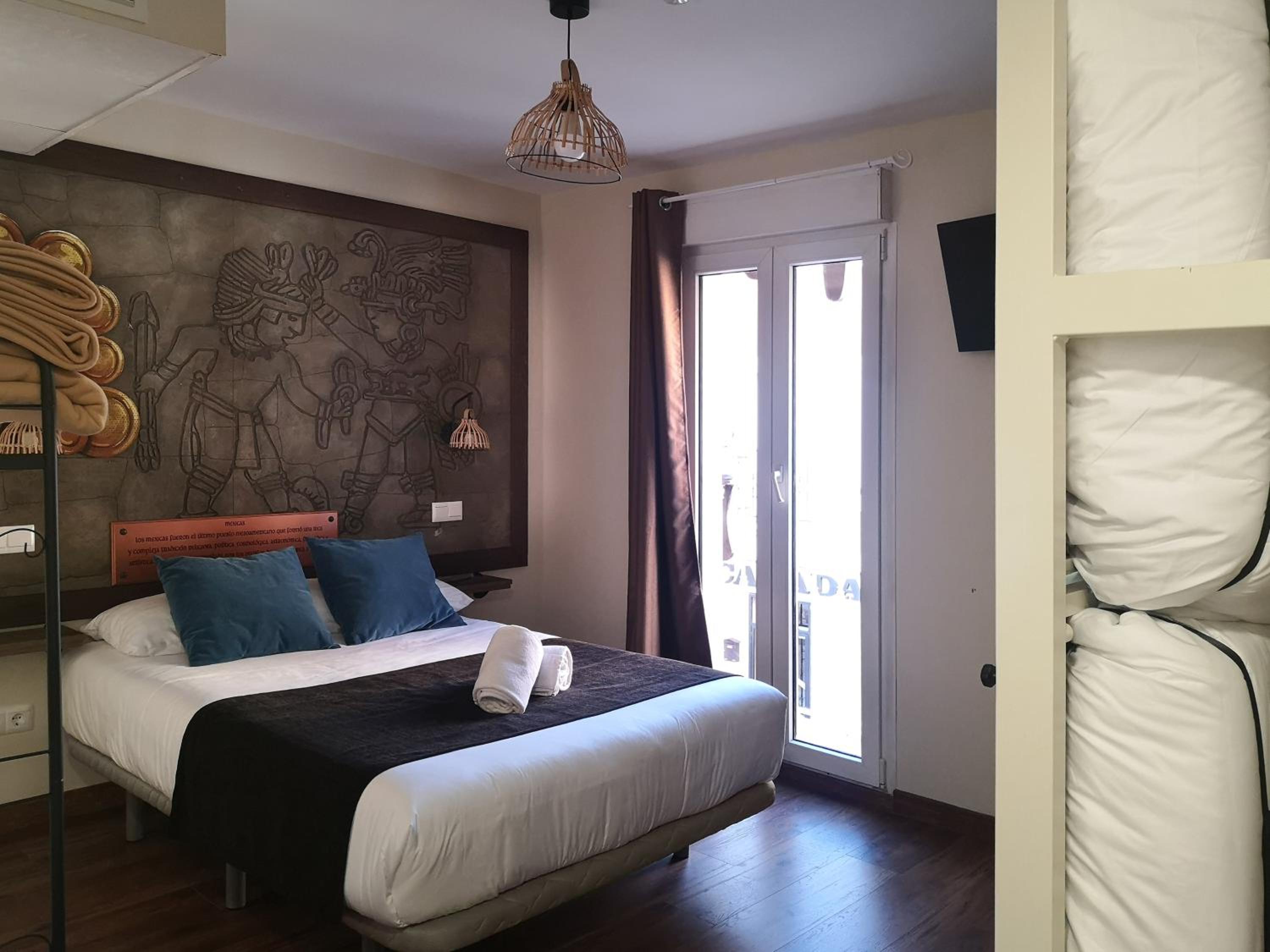Quadruple Room with Balcony - Photo 1