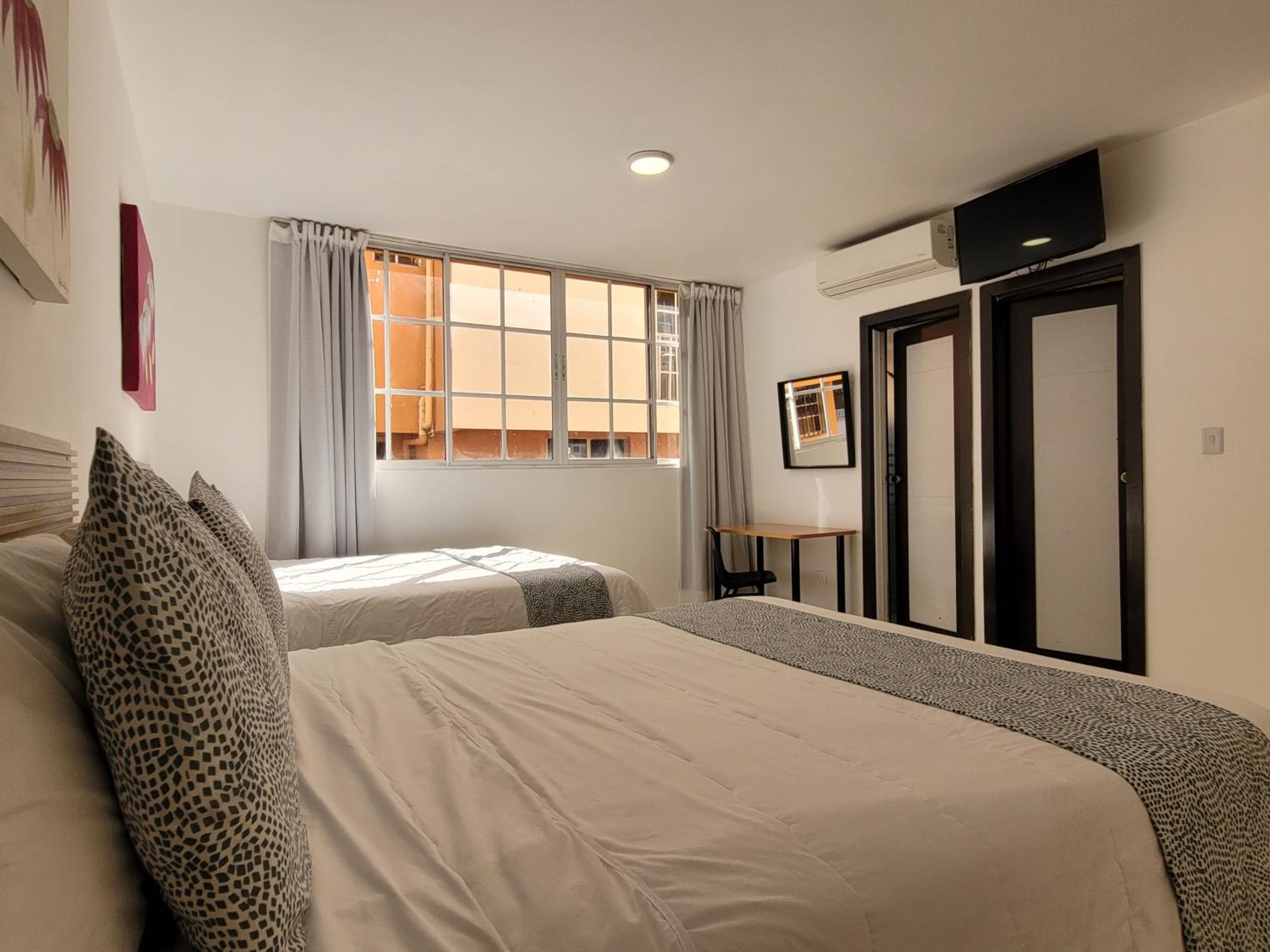 Queen Room with Two Queen Beds photo 1