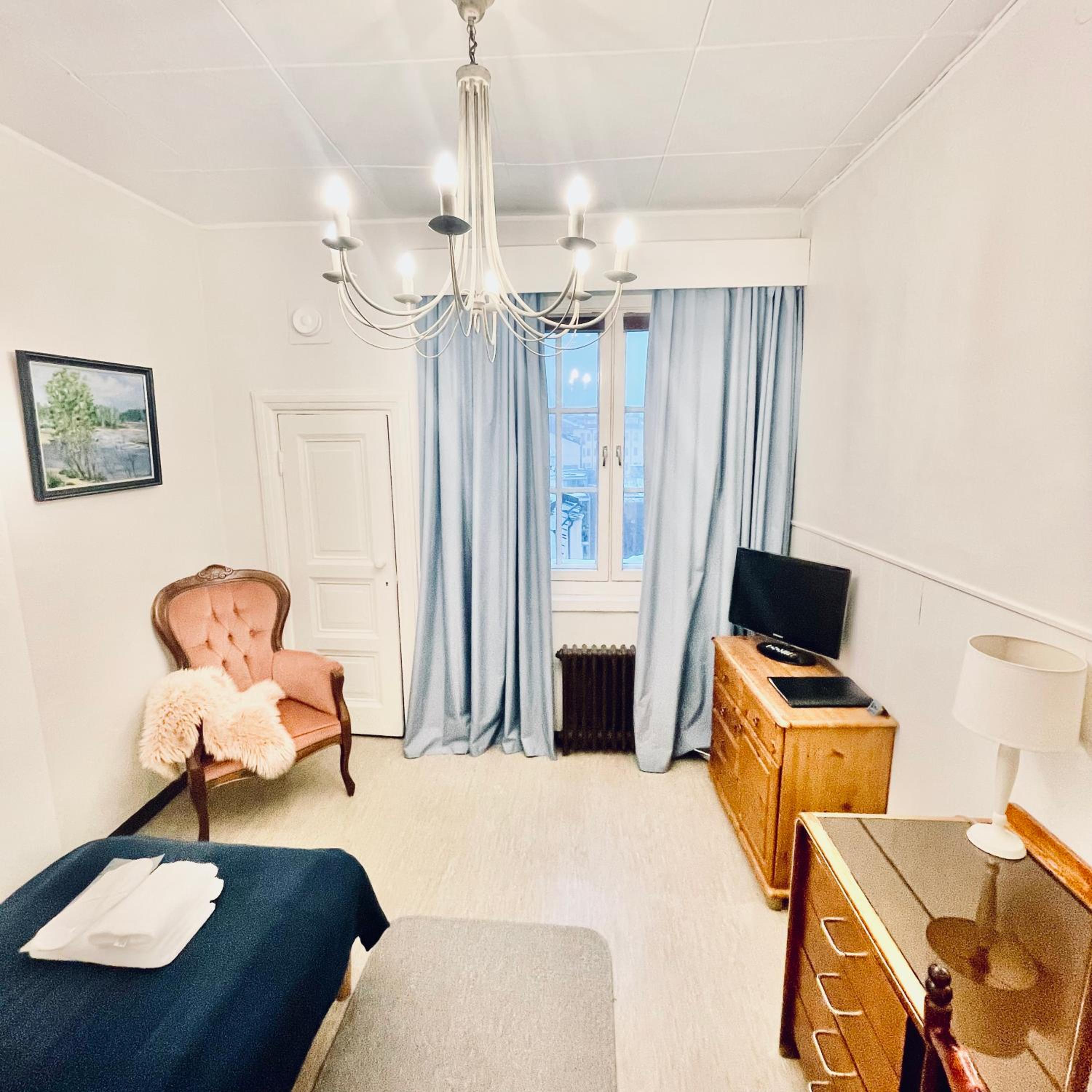 Single Room with City View - Shared Bathroom