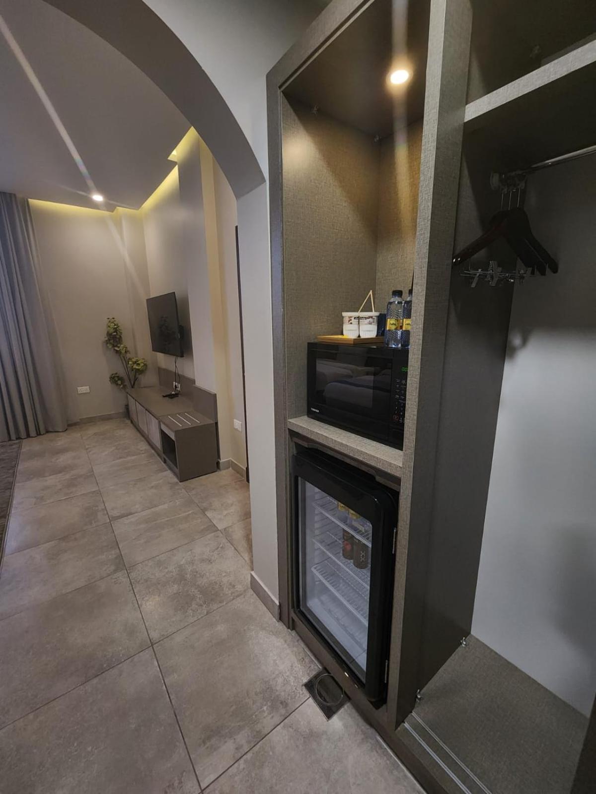 Three-Bedroom Apartment - Photo 8