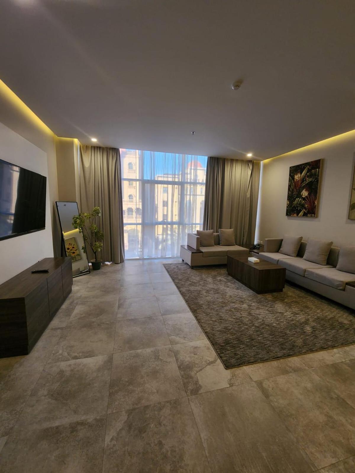 Three-Bedroom Apartment - Photo 15