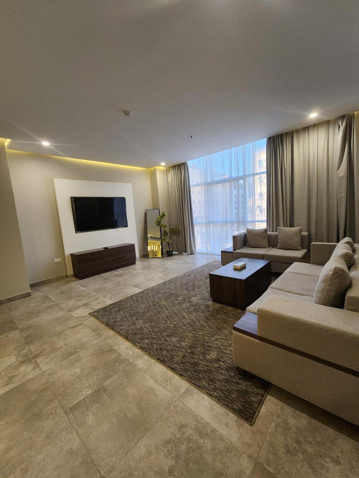 Three-Bedroom Apartment - Photo 13