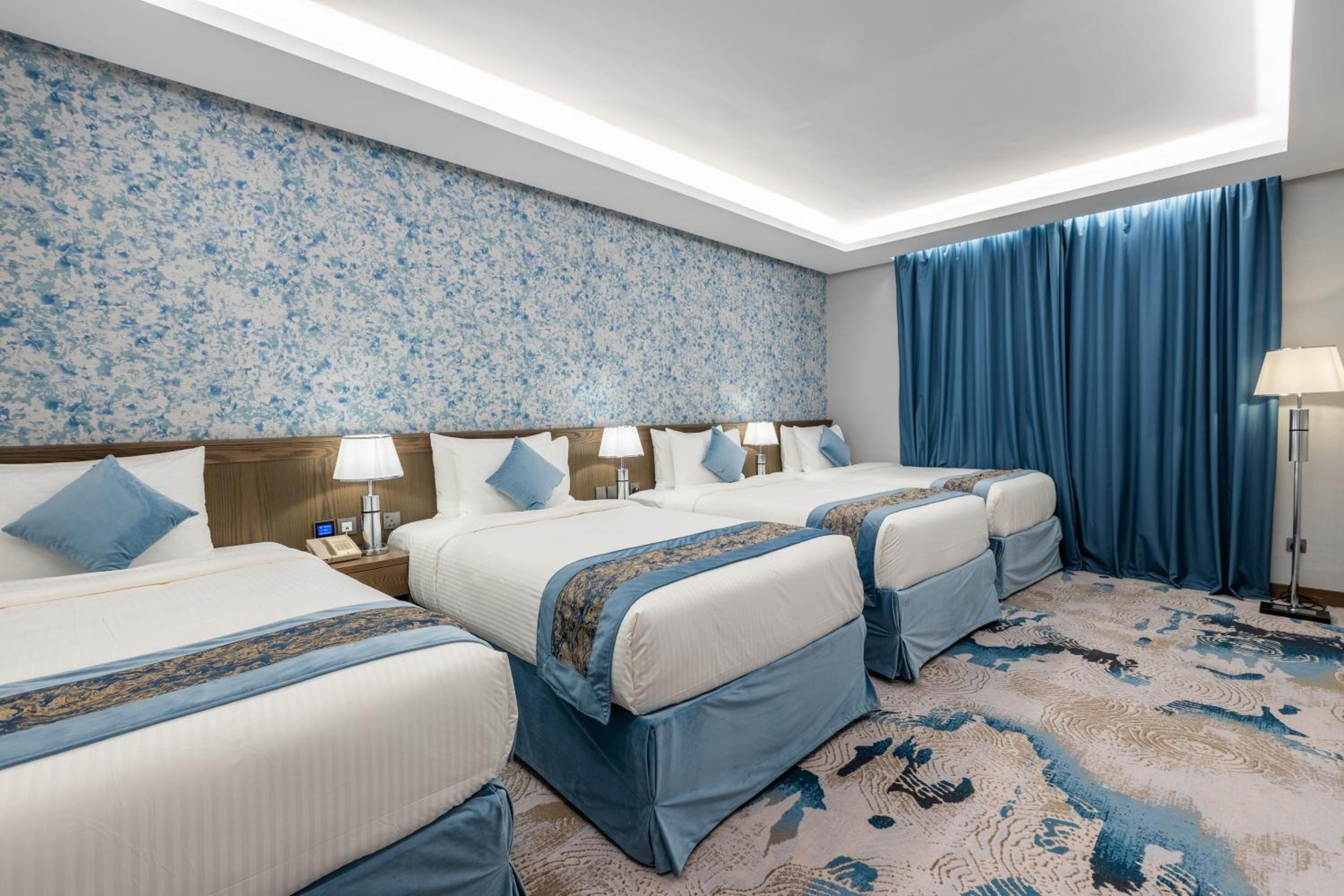 Deluxe Quadruple Room - Photo 1