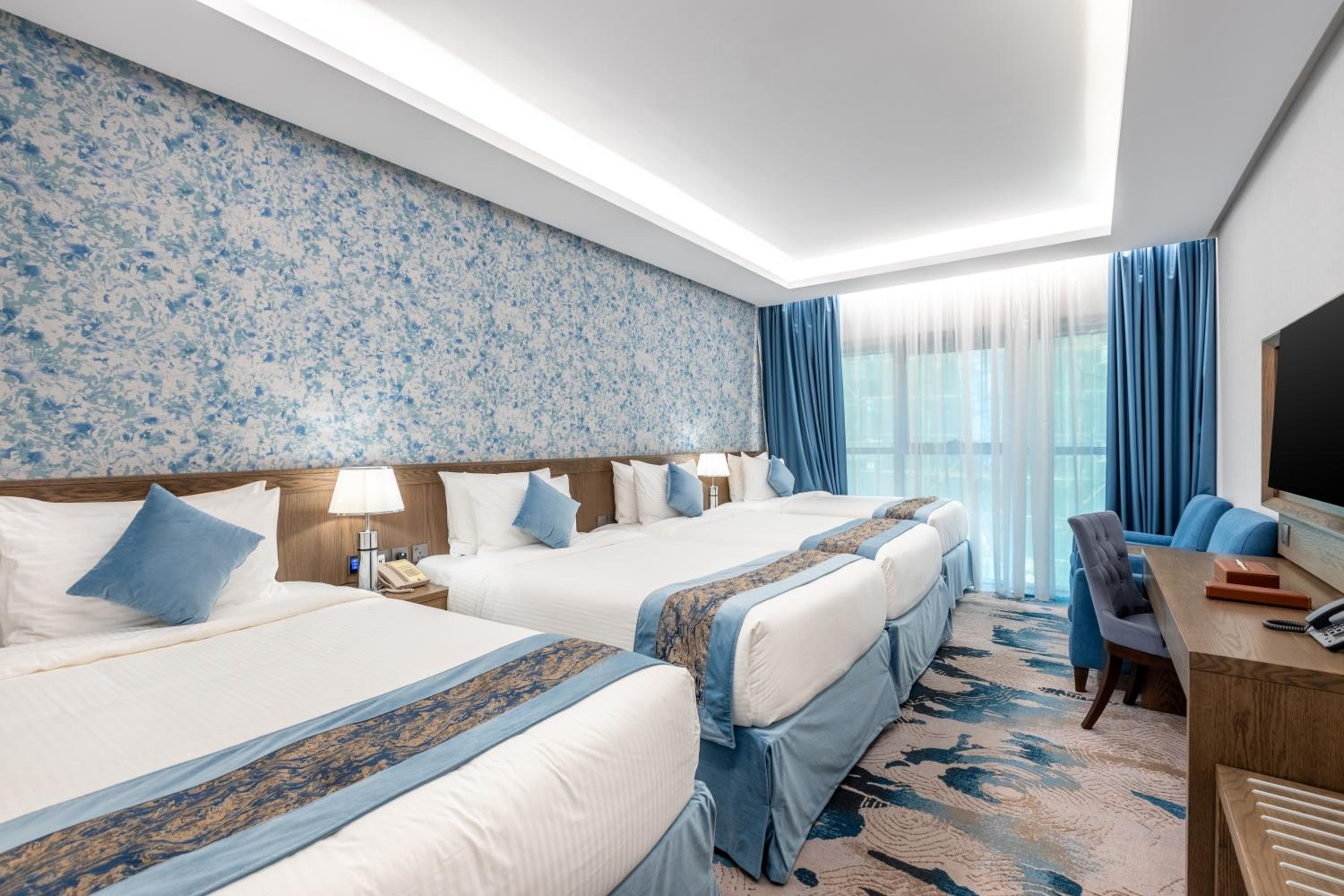 Deluxe Quadruple Room - Photo 4