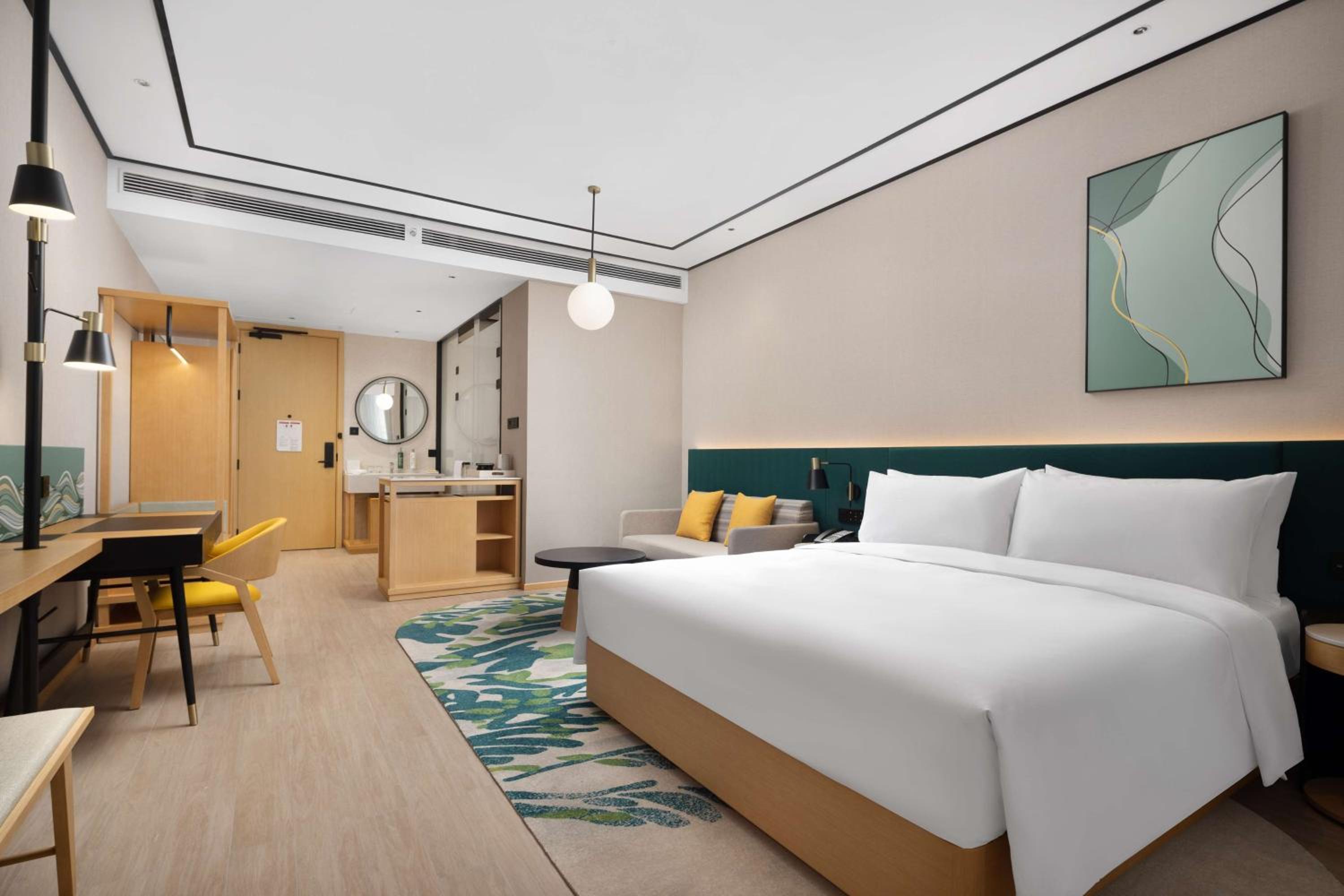 Deluxe King Room with Sofa Bed - Photo 1