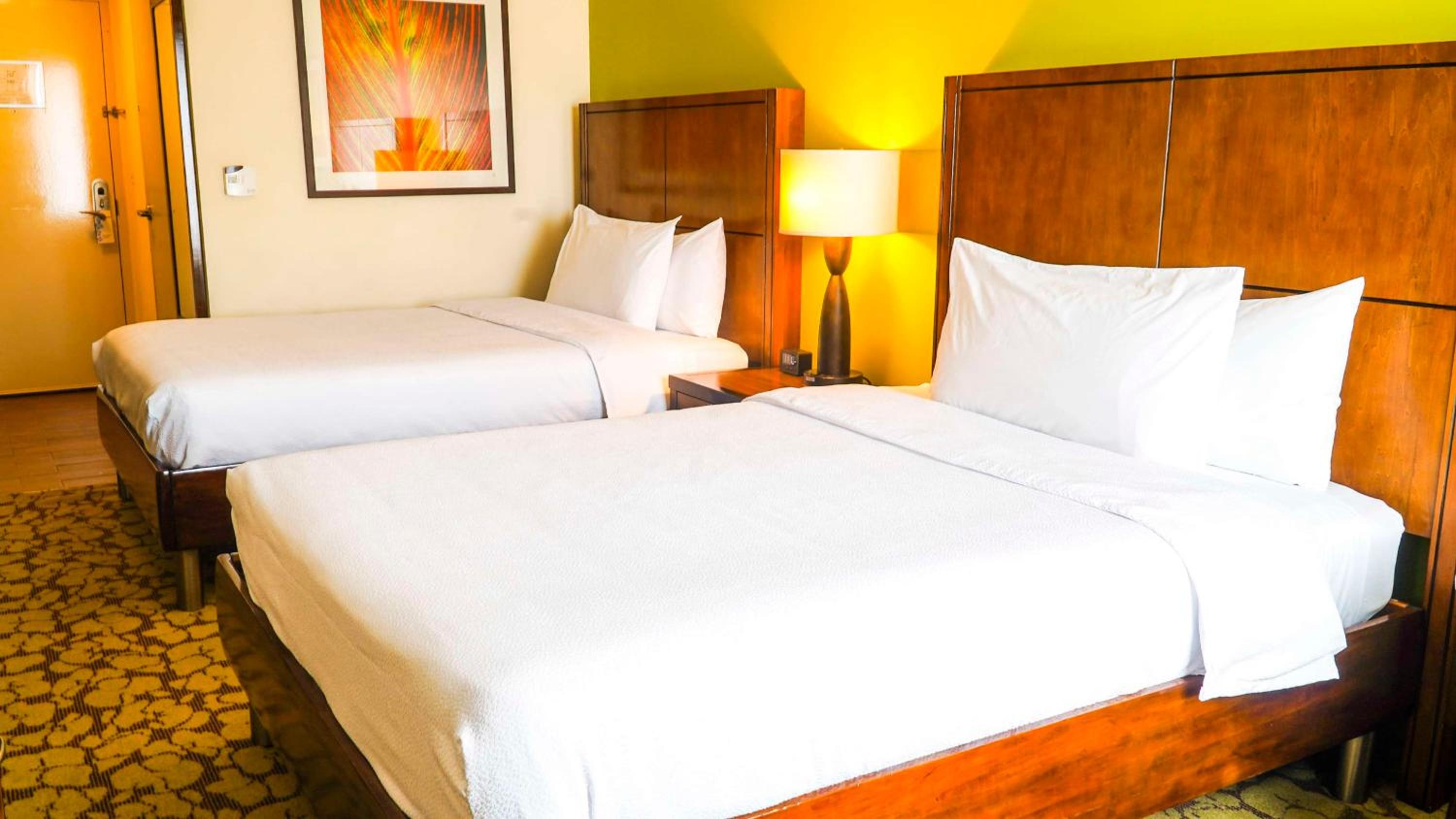 Queen Room with Two Queen Beds - Photo 1