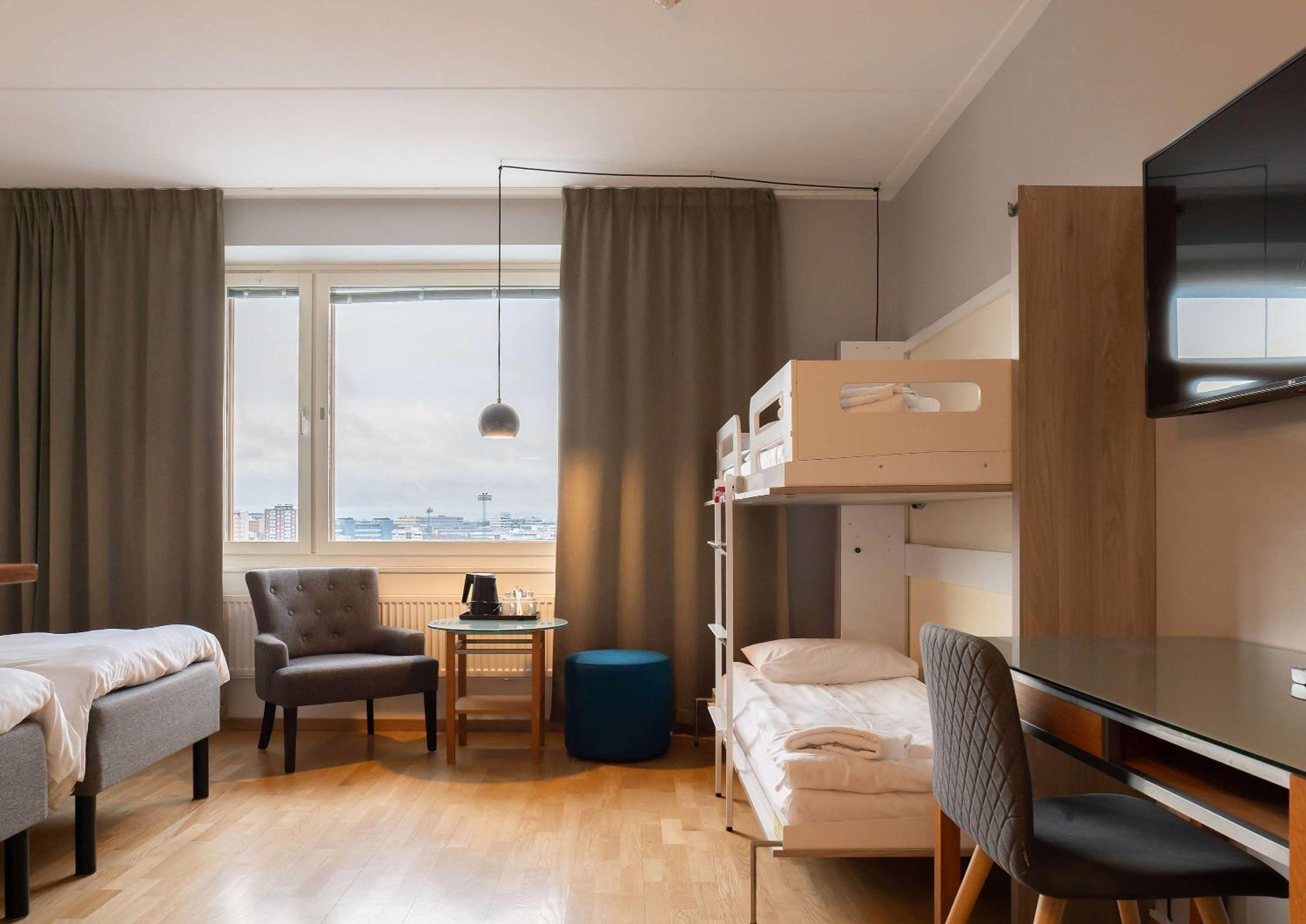 Family Room with Two Single Beds and One Sofa Bed - Photo 4