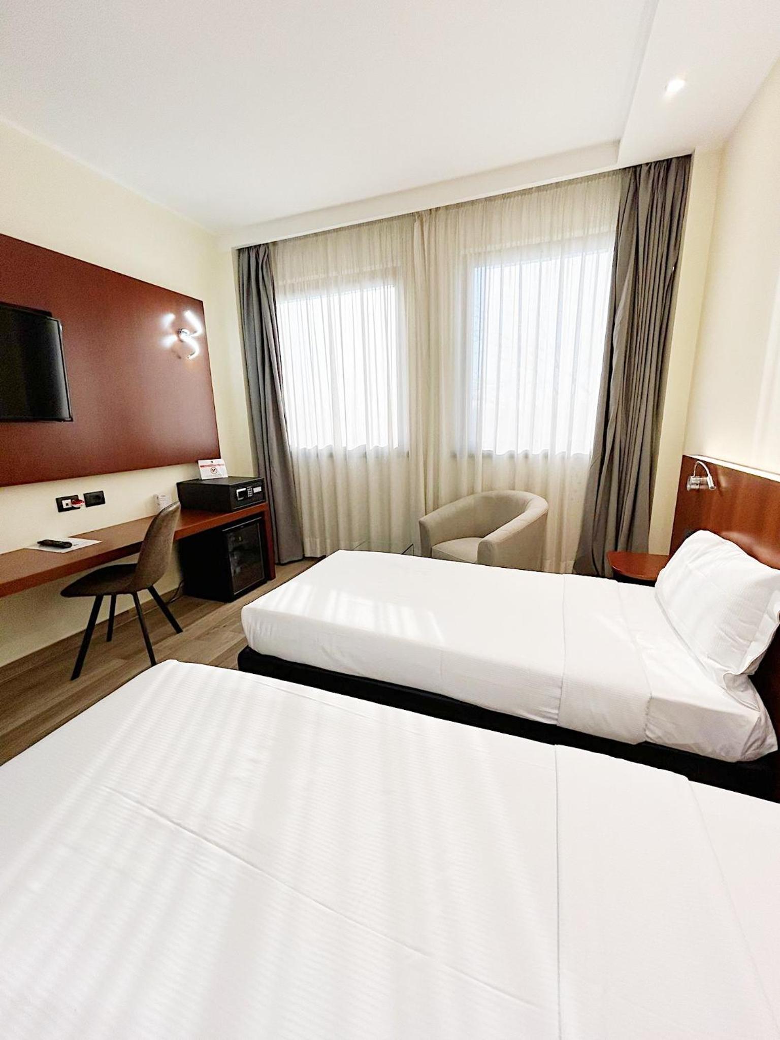 Twin Room - Photo 1