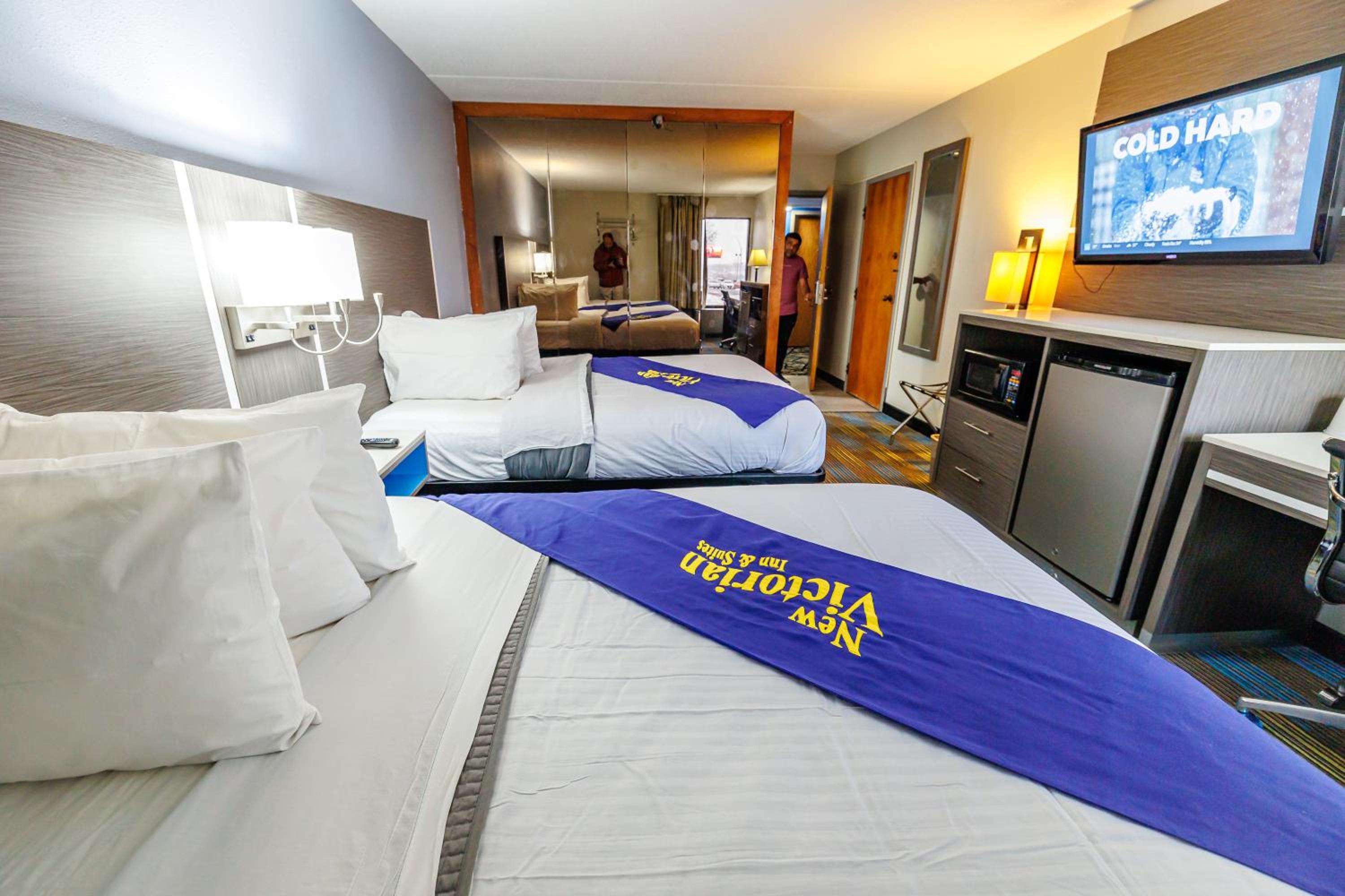 Deluxe Queen Room With Two Queen Beds photo 2