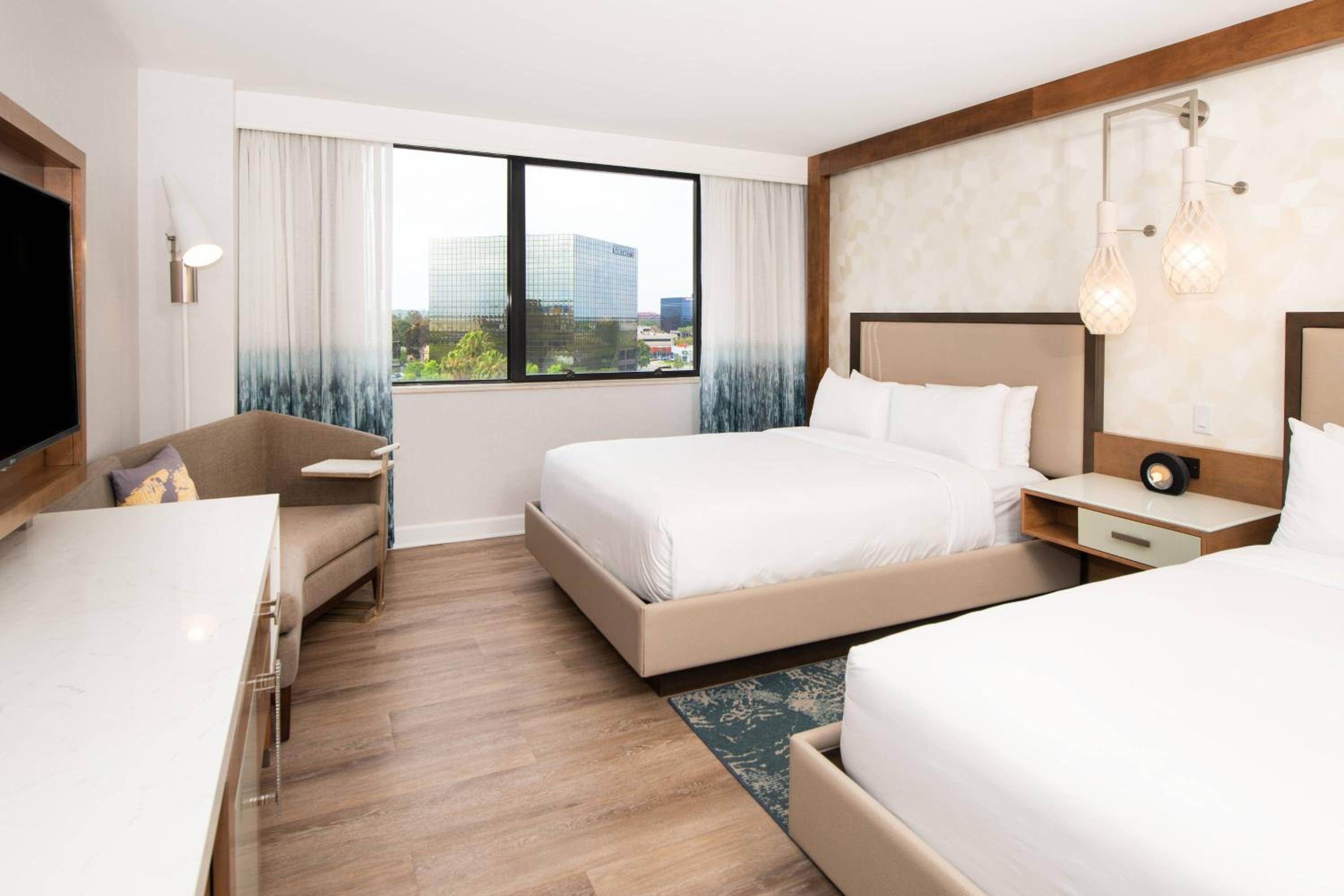 Queen Room with Two Queen Beds - Photo 1