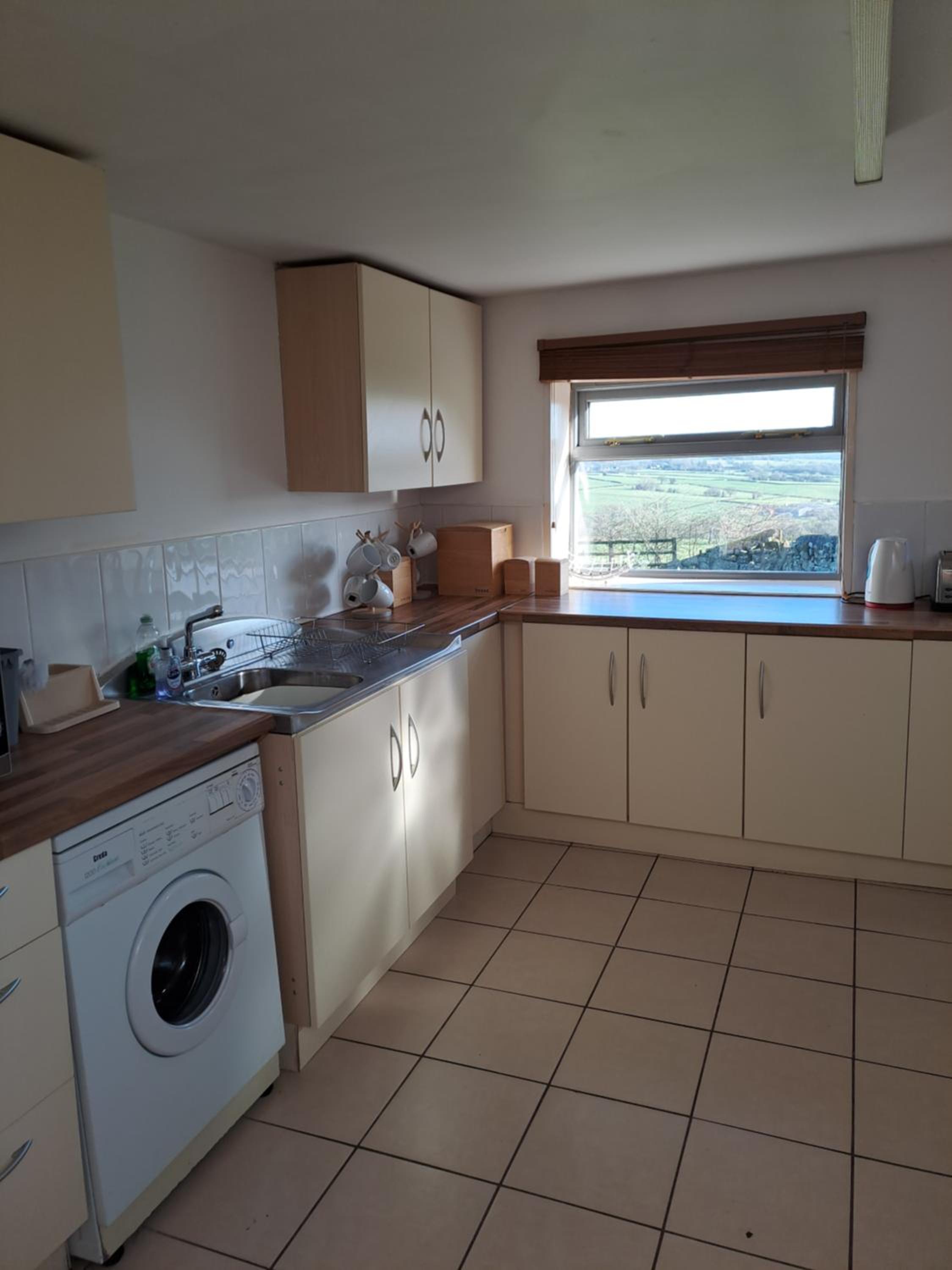Three-Bedroom House - Photo 7
