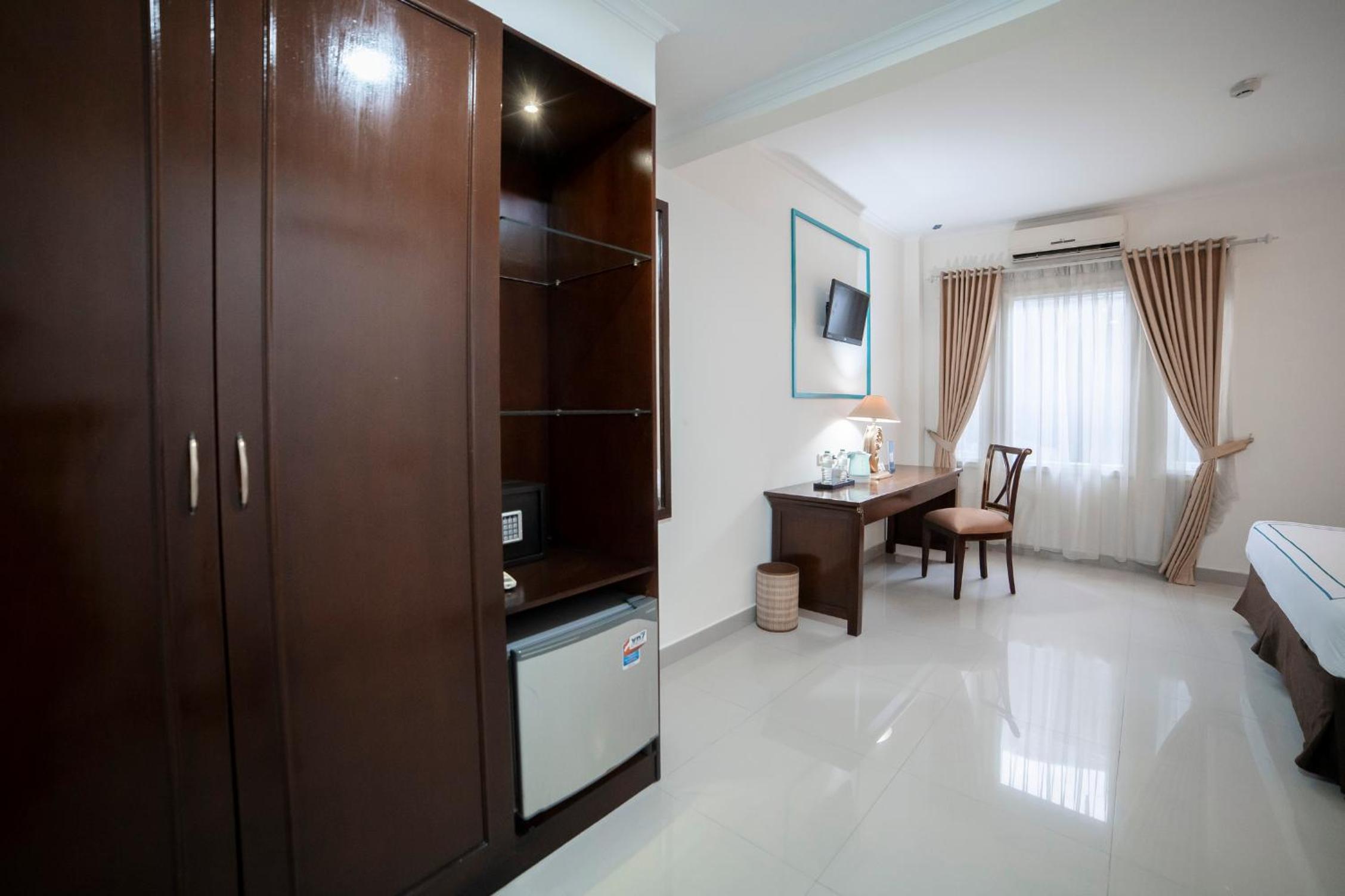 Deluxe Room - Photo 11