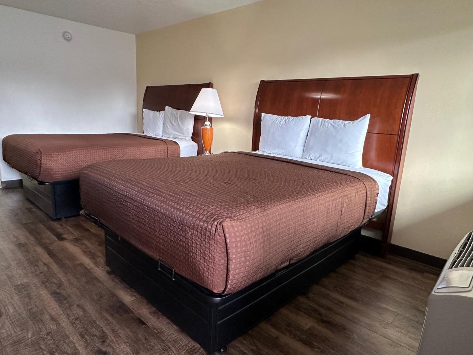 Deluxe Queen Room with Two Queen Beds - Non-Smoking photo 1