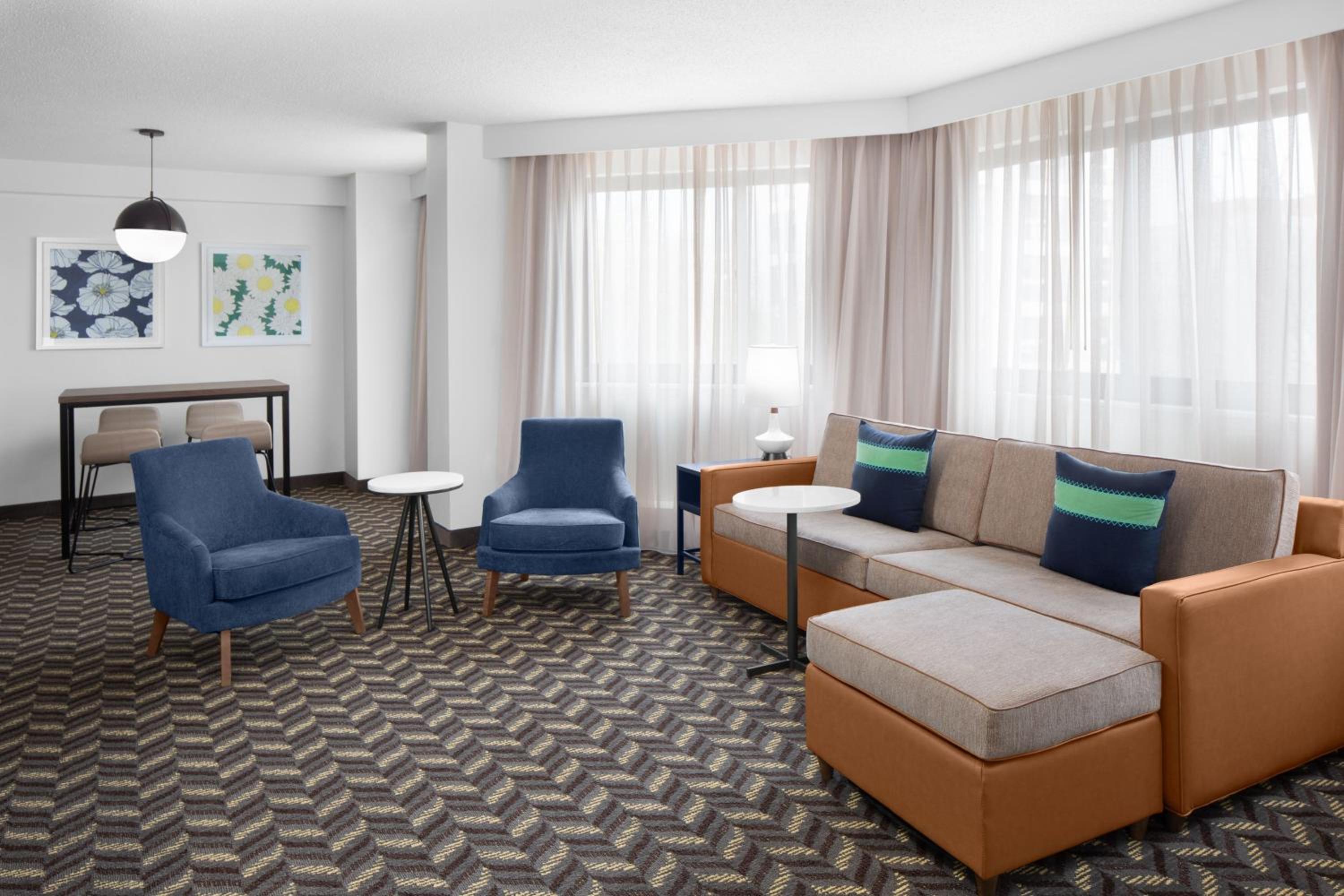 One- Bedroom Corner King Suite with Sofa Bed - Photo 1
