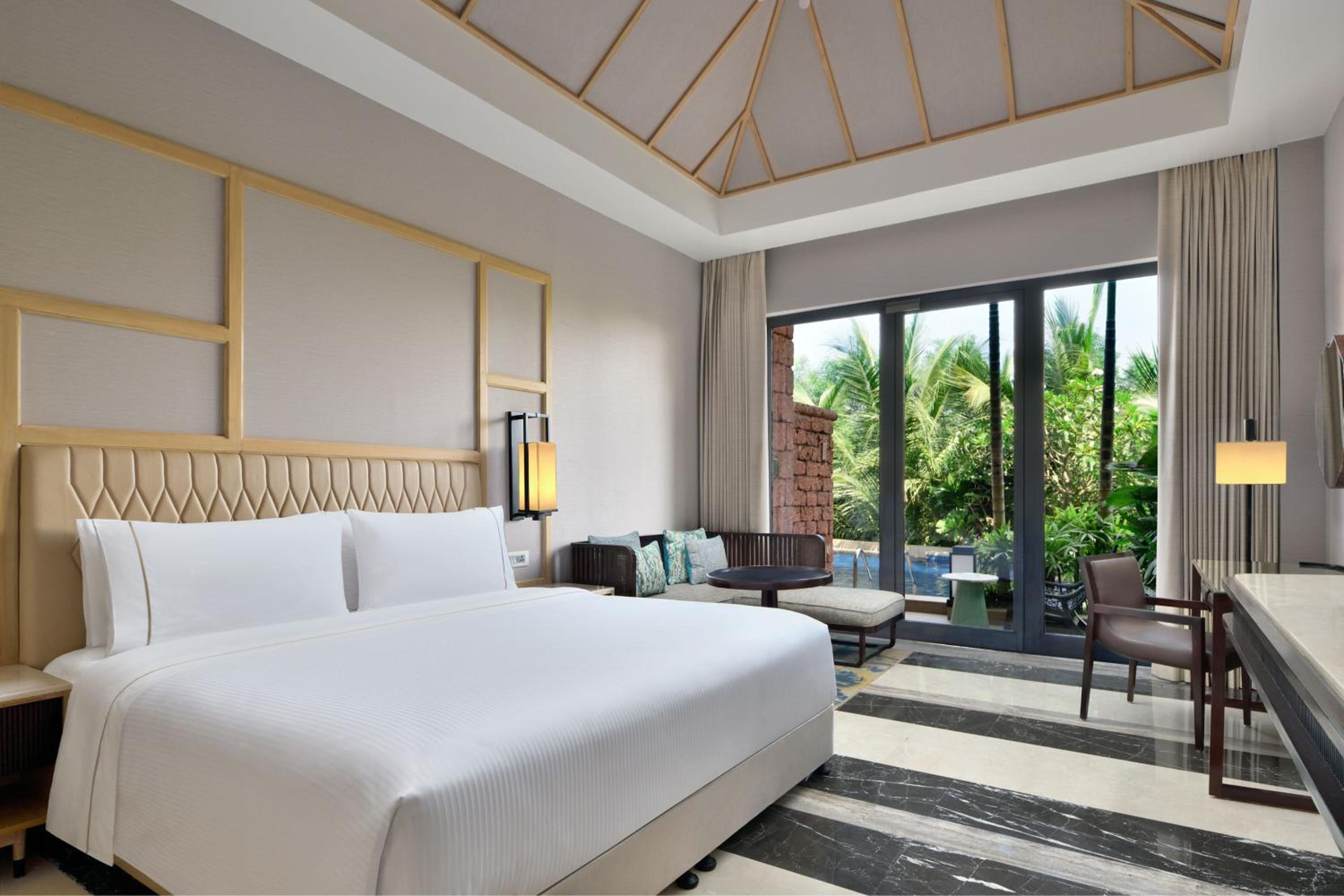 Patio Guest Room, 1 King, Poolside View, Pool Access -90 minutes of comp Cocktail hrs at Haven between 4PM to 6PM - 1000 SPA Credit (Stay between Sunday to Thursday) - Comp beer on arrival & free shuttle to the beach-INR 750 Credit at Drift once per stay
