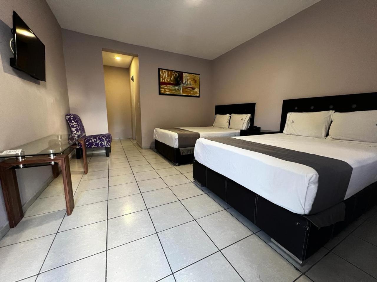 Twin Room - Photo 1