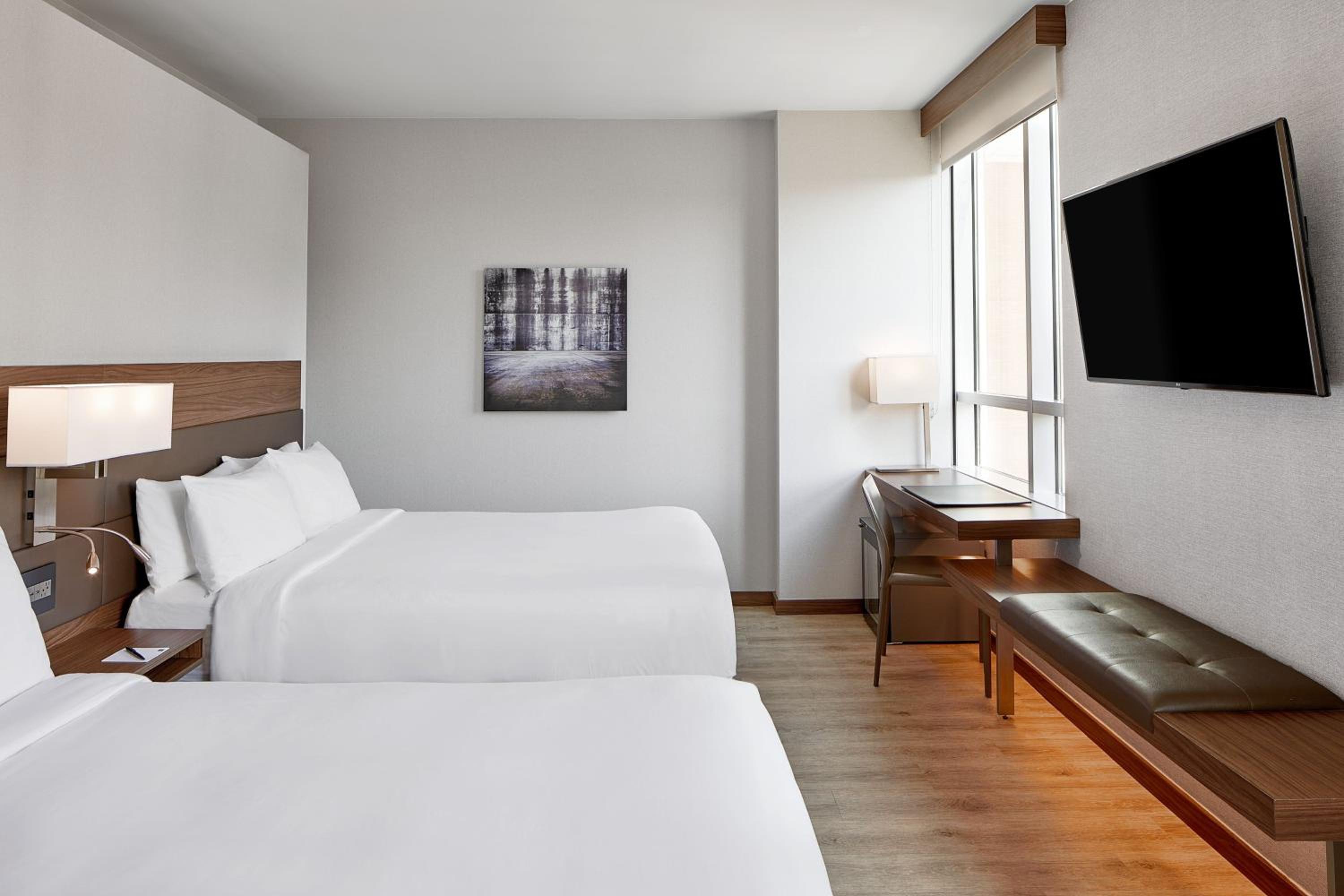 Queen Room with Two Queen Beds - Photo 1