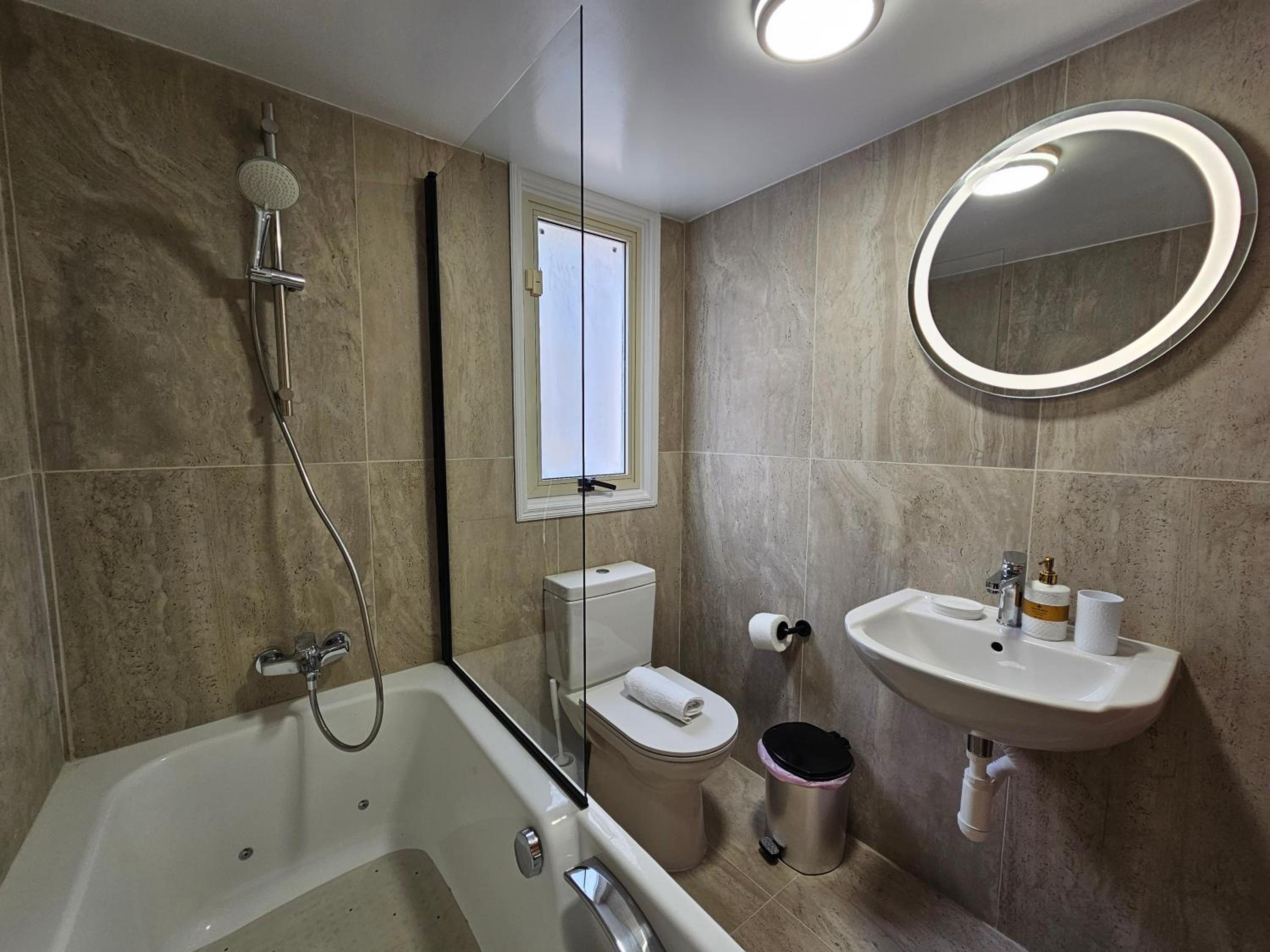 Three-Bedroom House - Photo 47