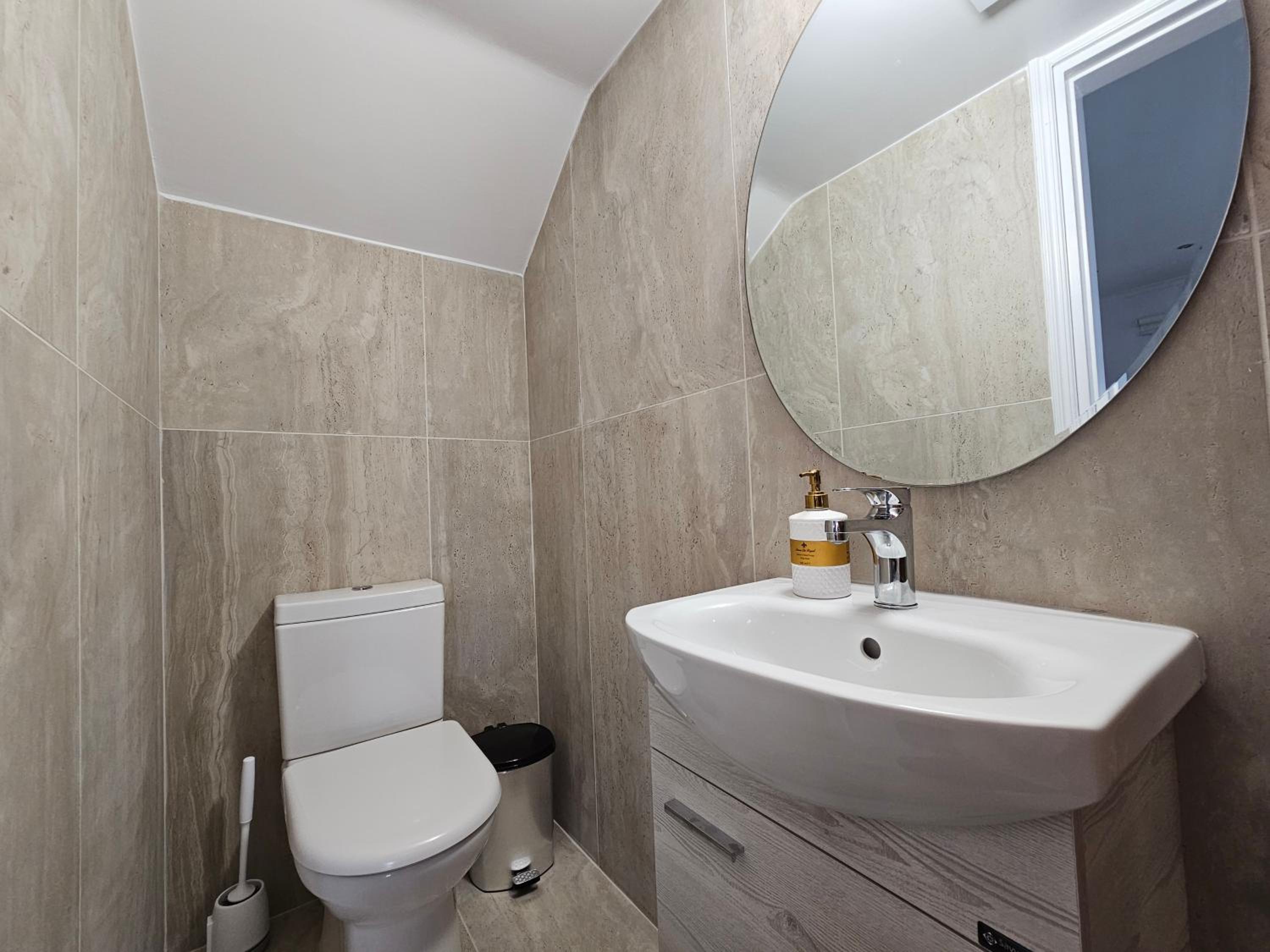 Three-Bedroom House - Photo 18