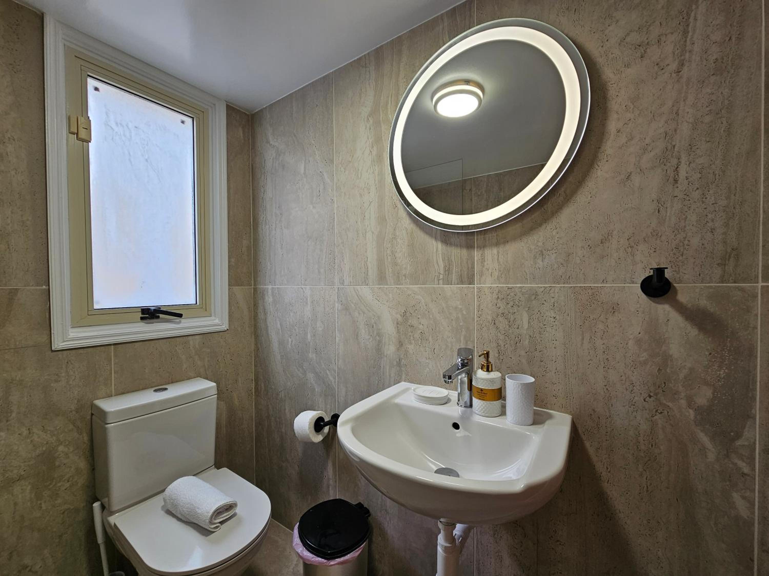 Three-Bedroom House - Photo 16