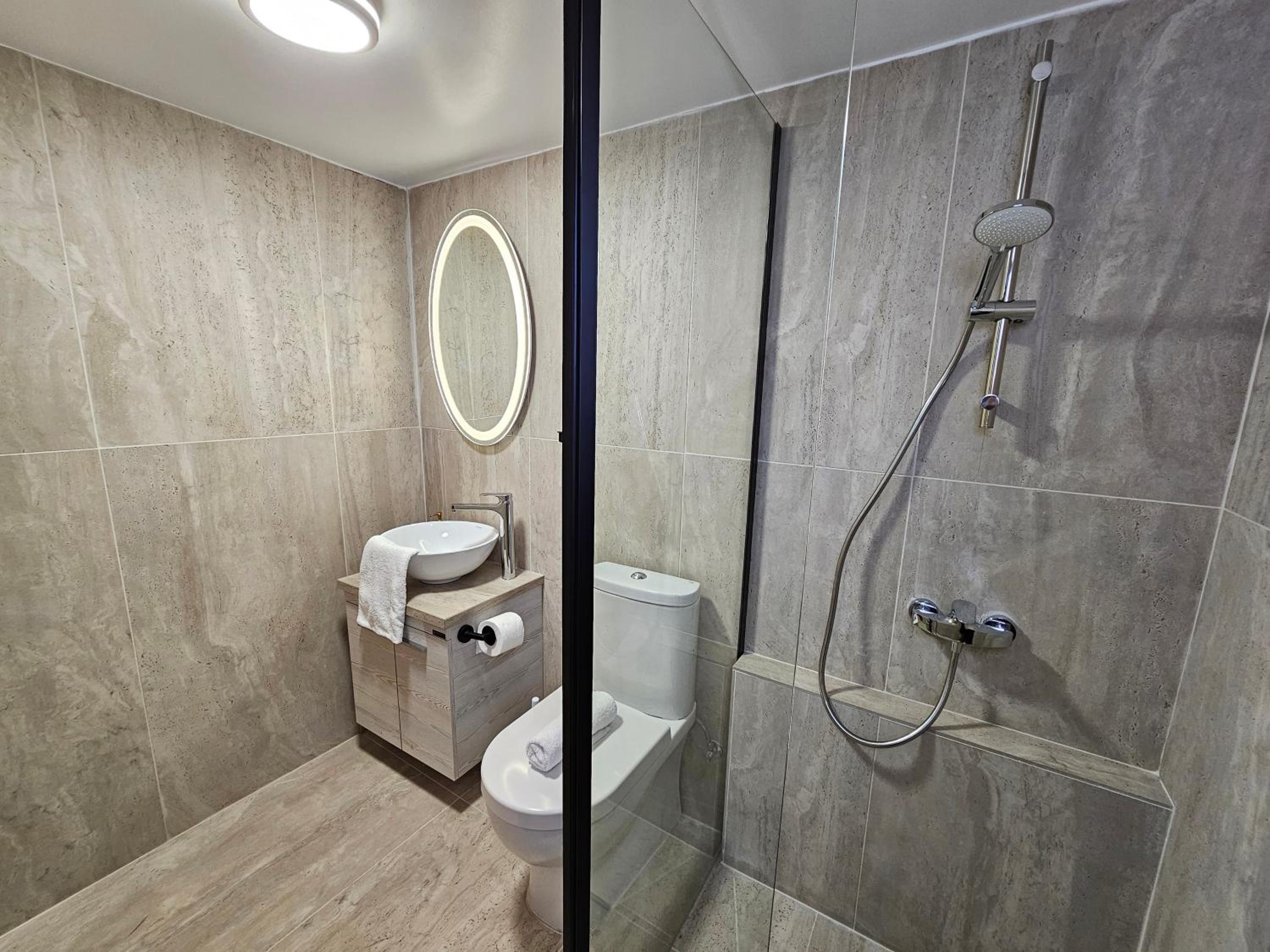Three-Bedroom House - Photo 50