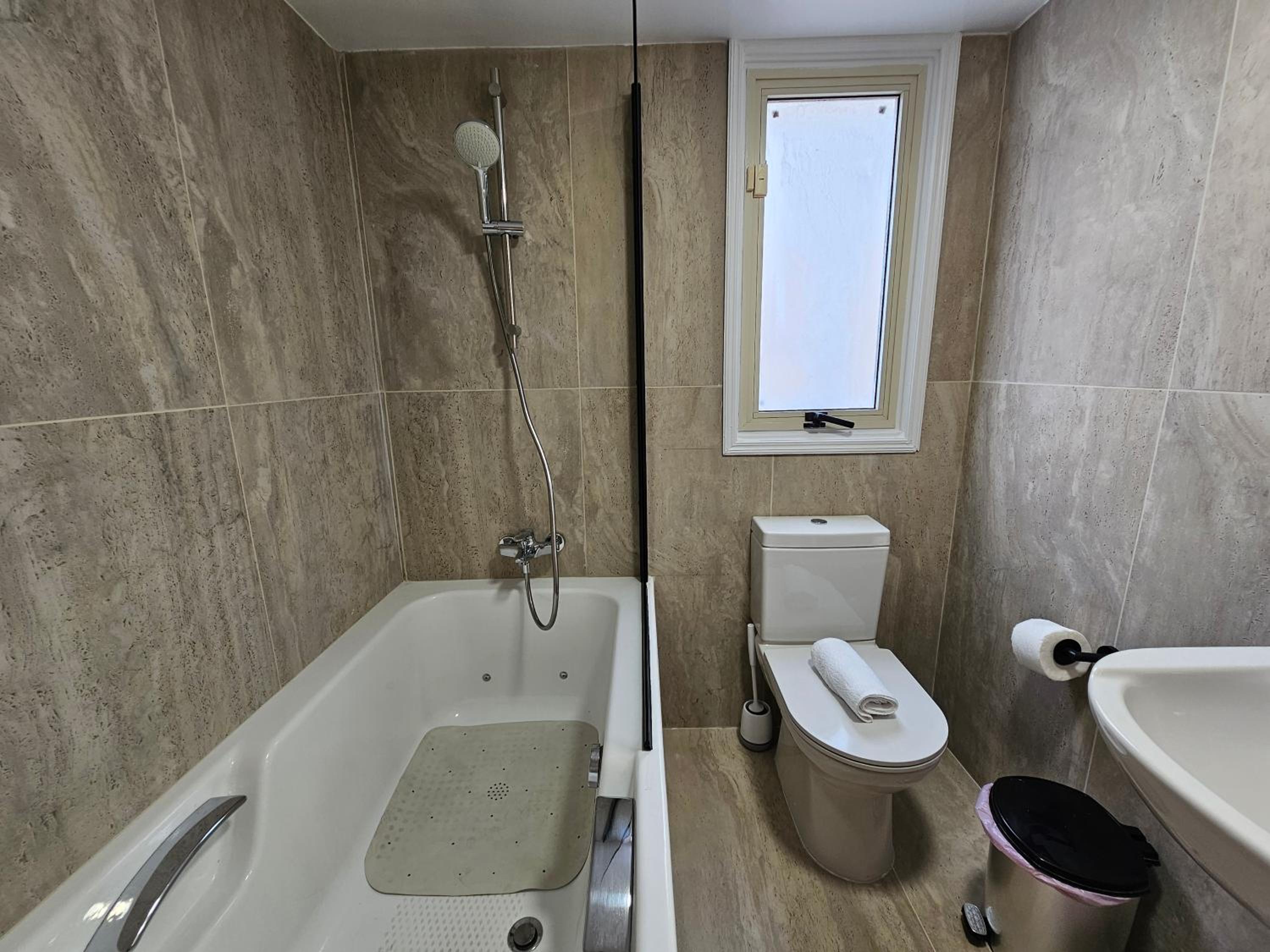 Three-Bedroom House - Photo 15