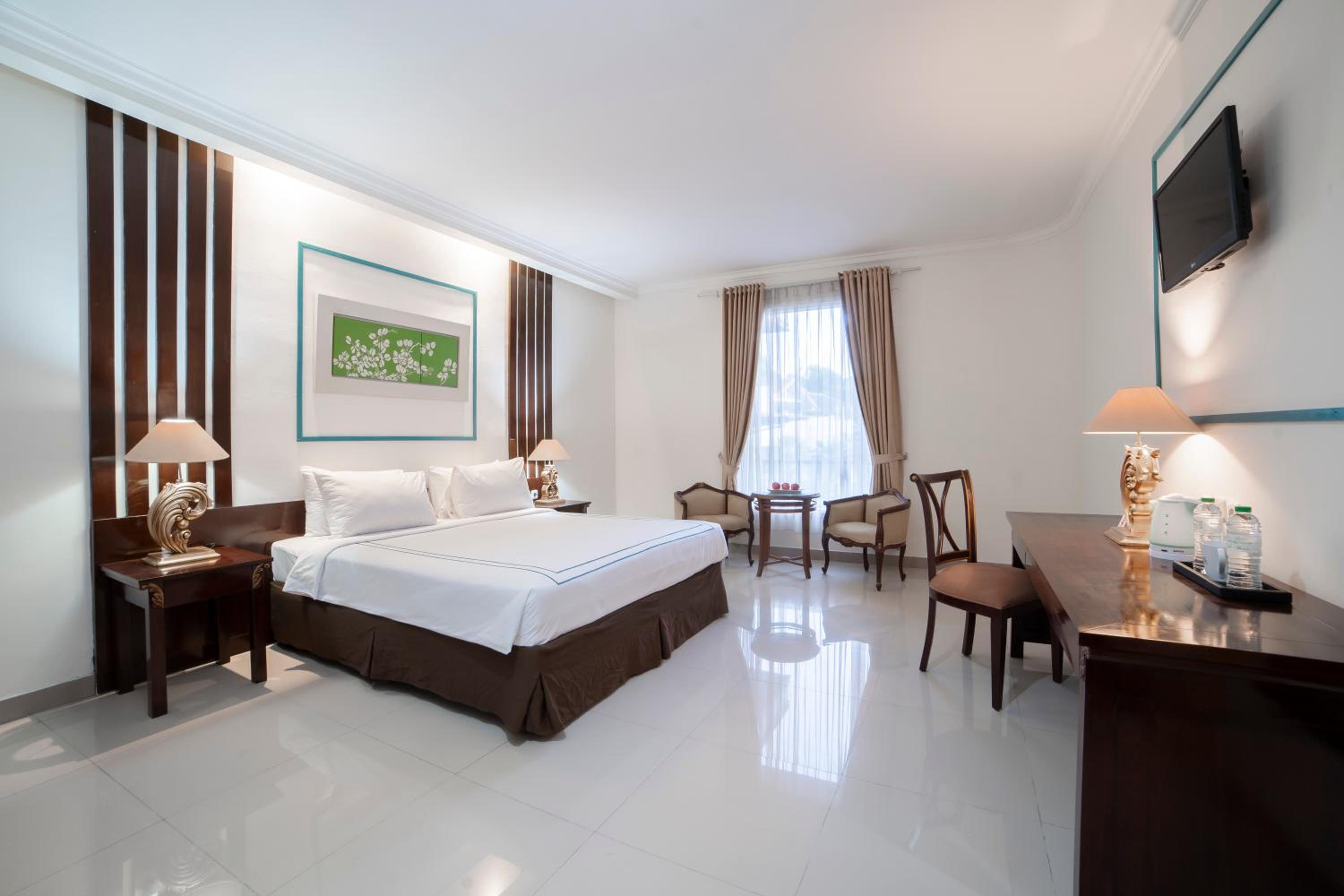 Deluxe Room - Photo 9