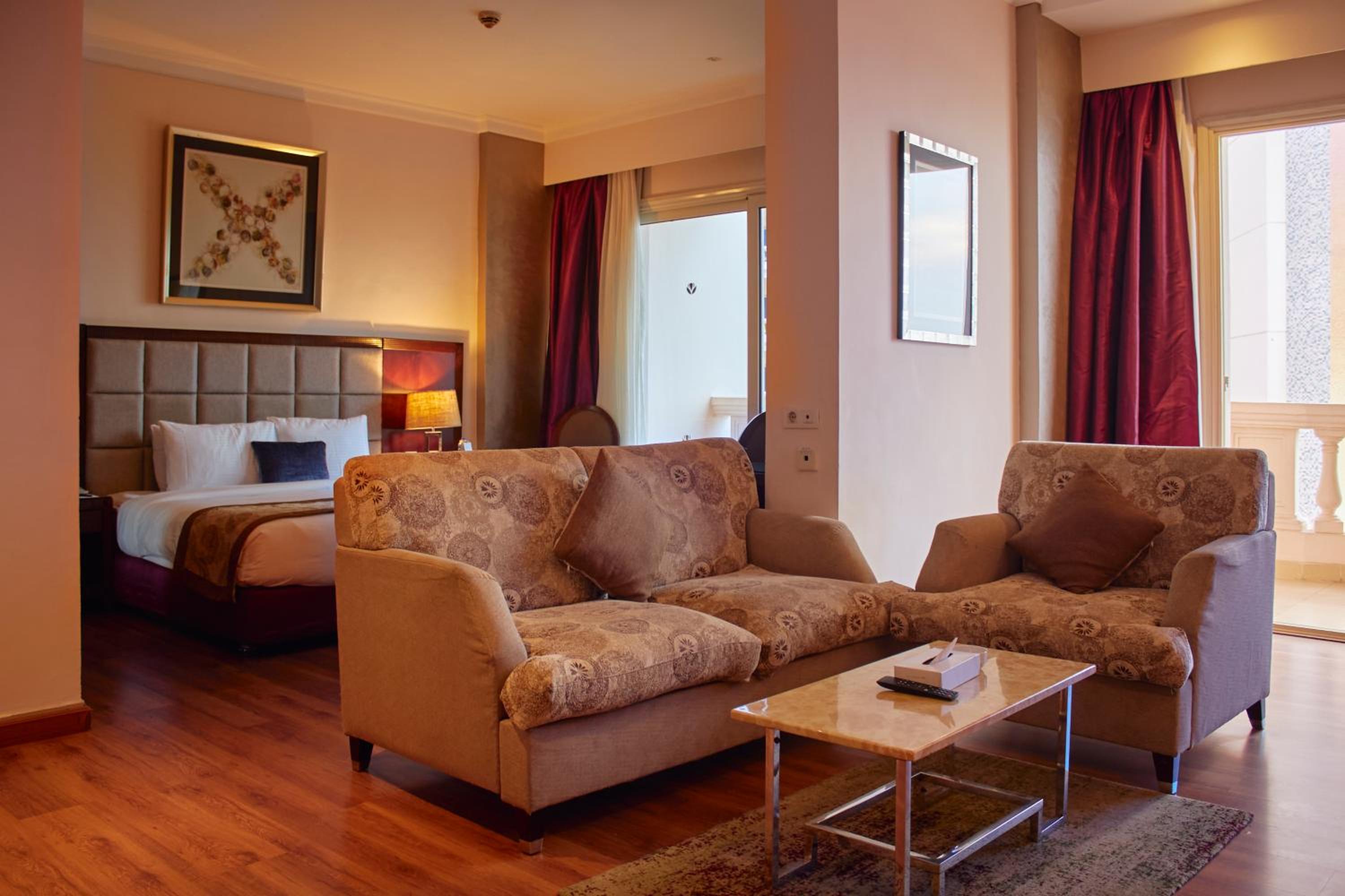 One-Bedroom Suite with Sea and Pool View