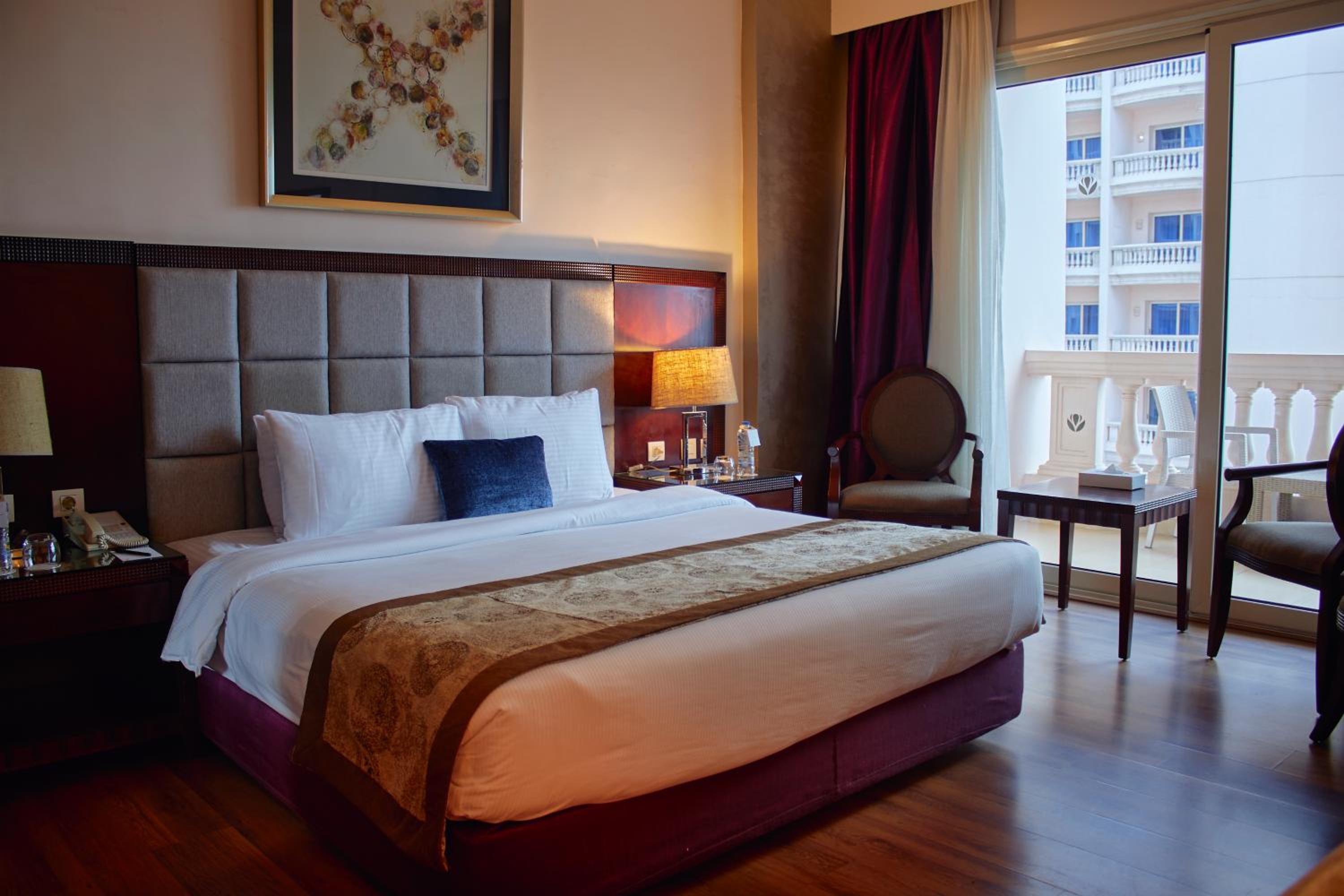 One-Bedroom Suite with Sea and Pool View