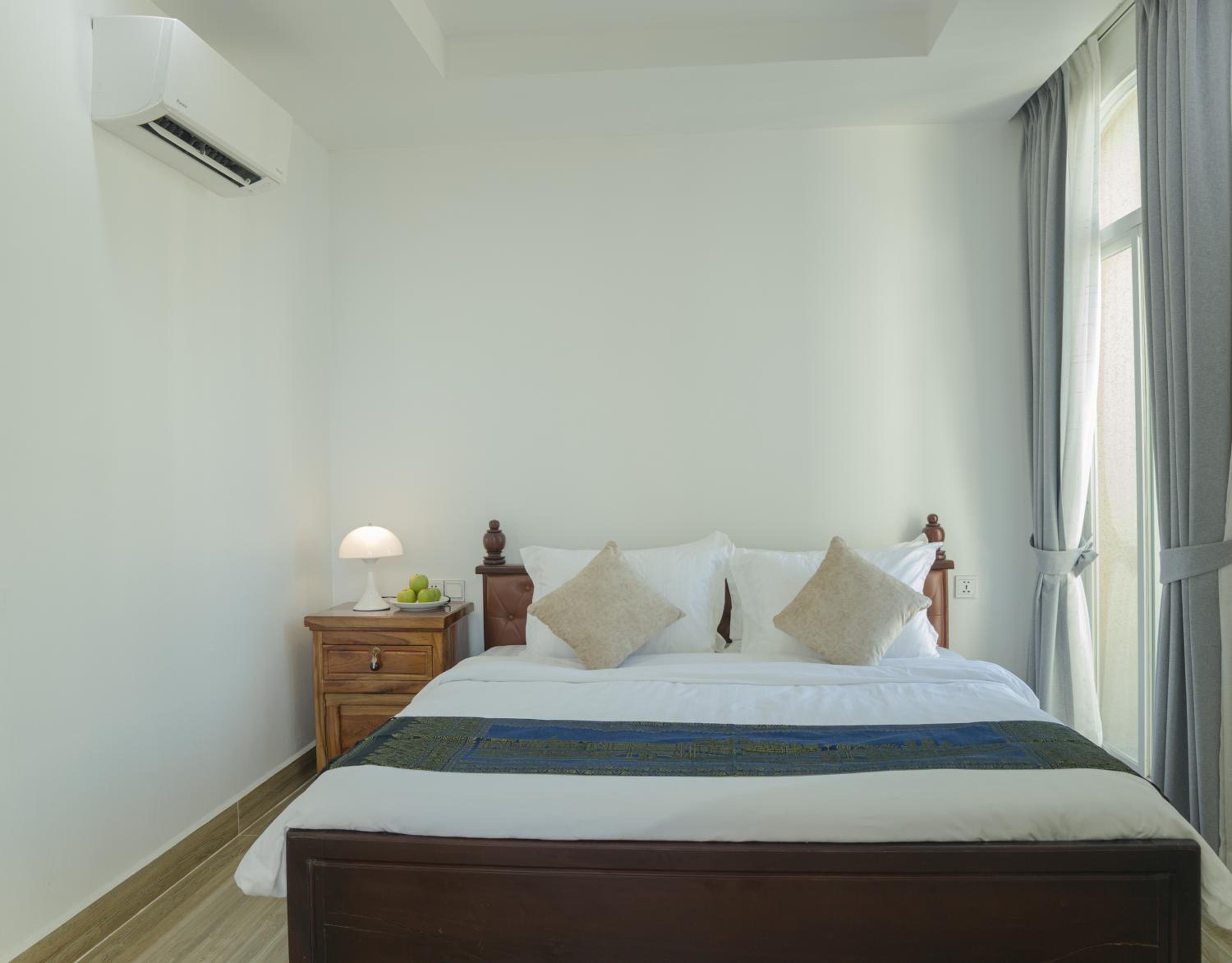 Two-Bedroom Apartment - Photo 13