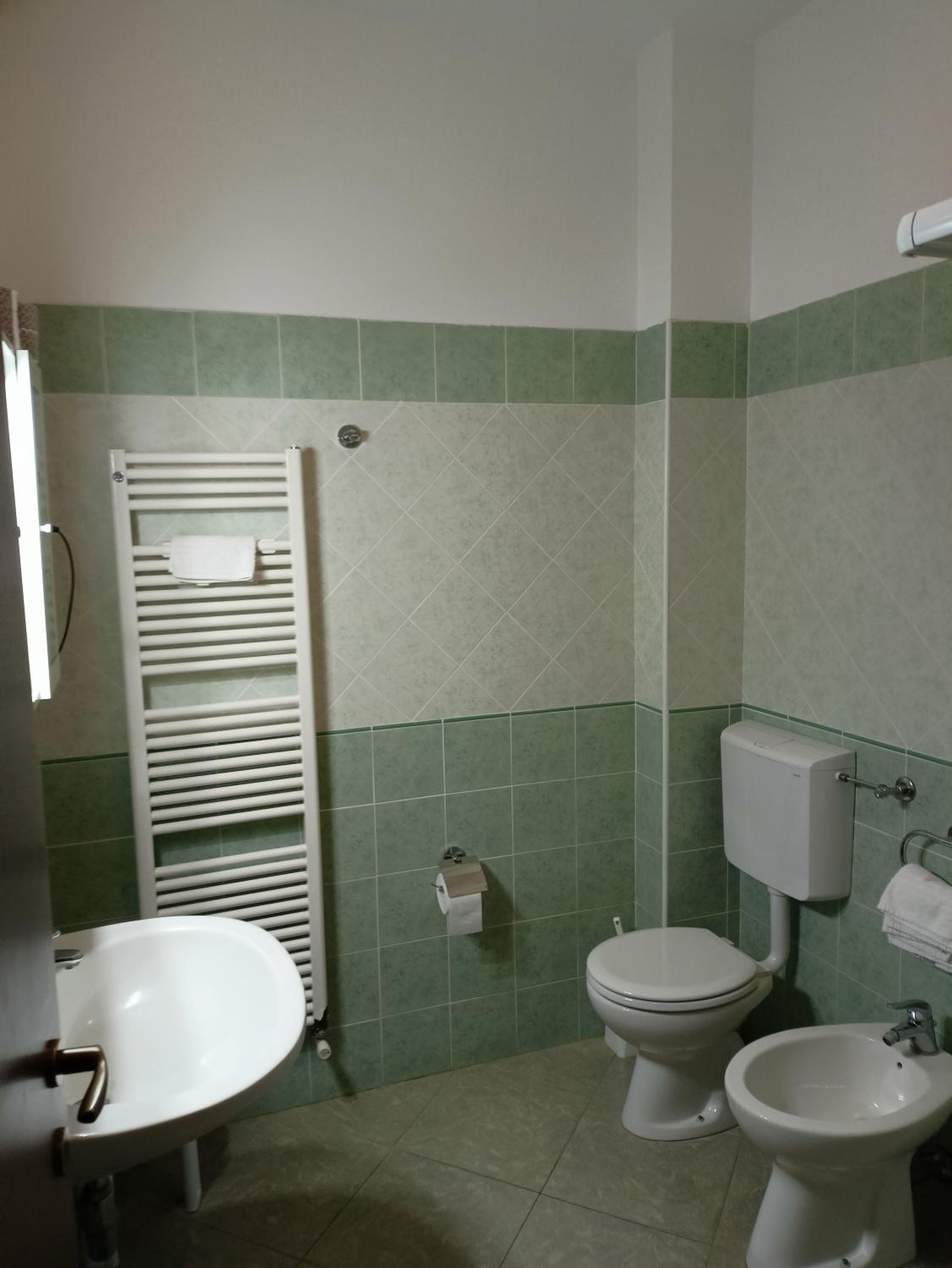 Quadruple Room with Balcony - Photo 3