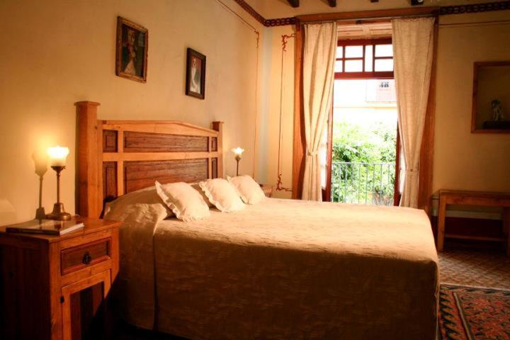 King Suite with Balcony - Photo 9