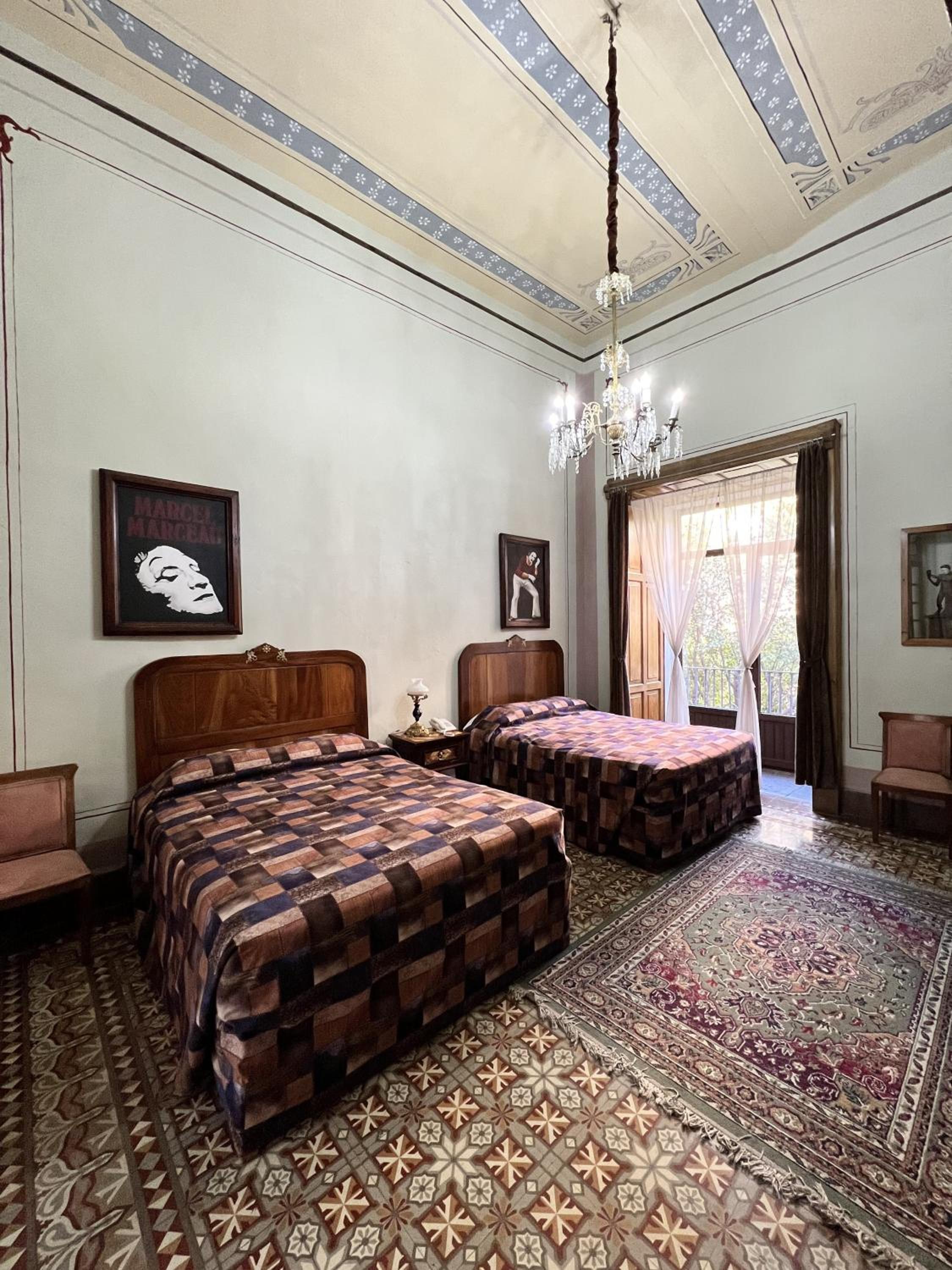 Quadruple Room with Balcony - Photo 1