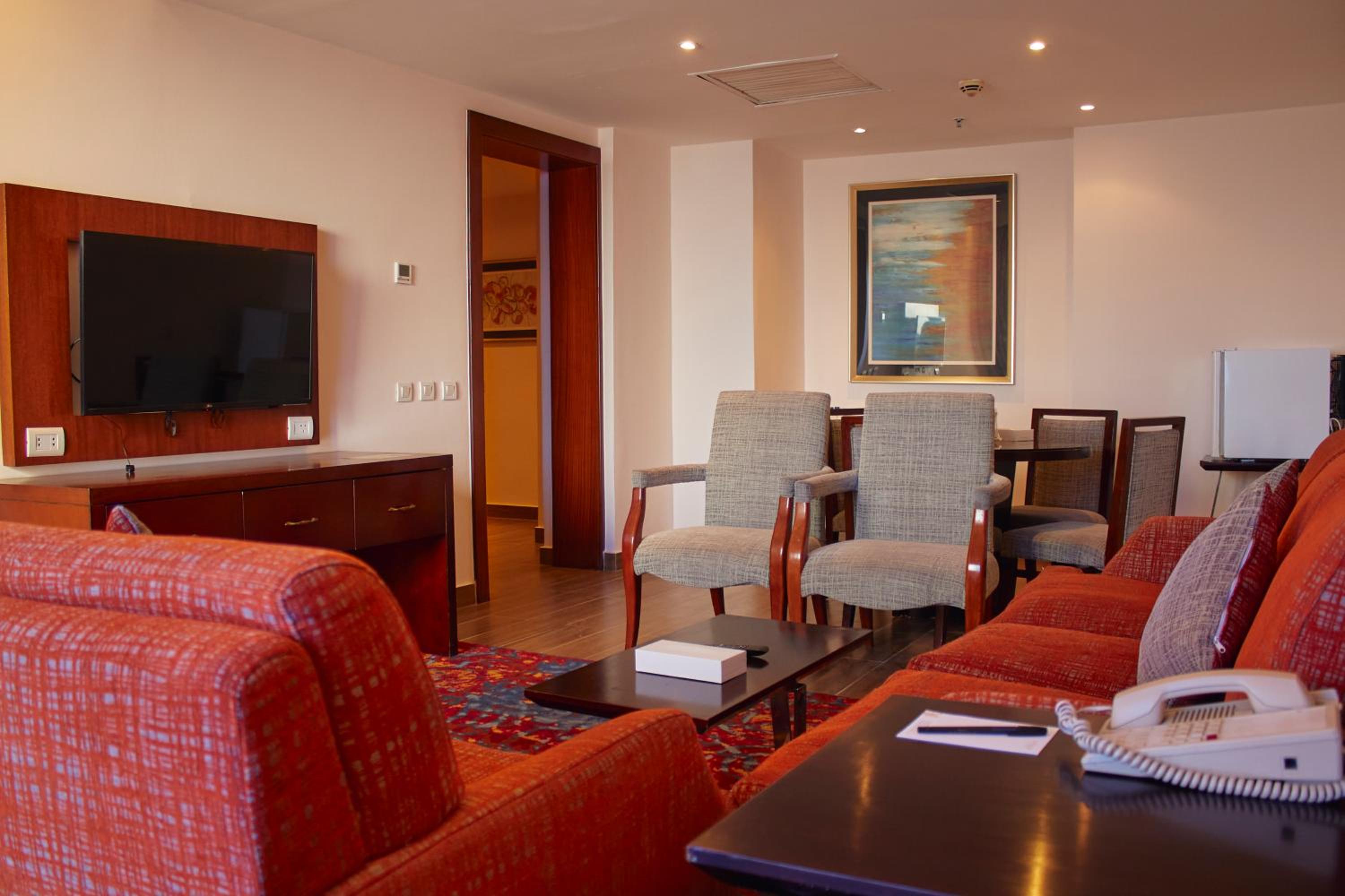 Two-Bedroom Suite with Sea and Pool View