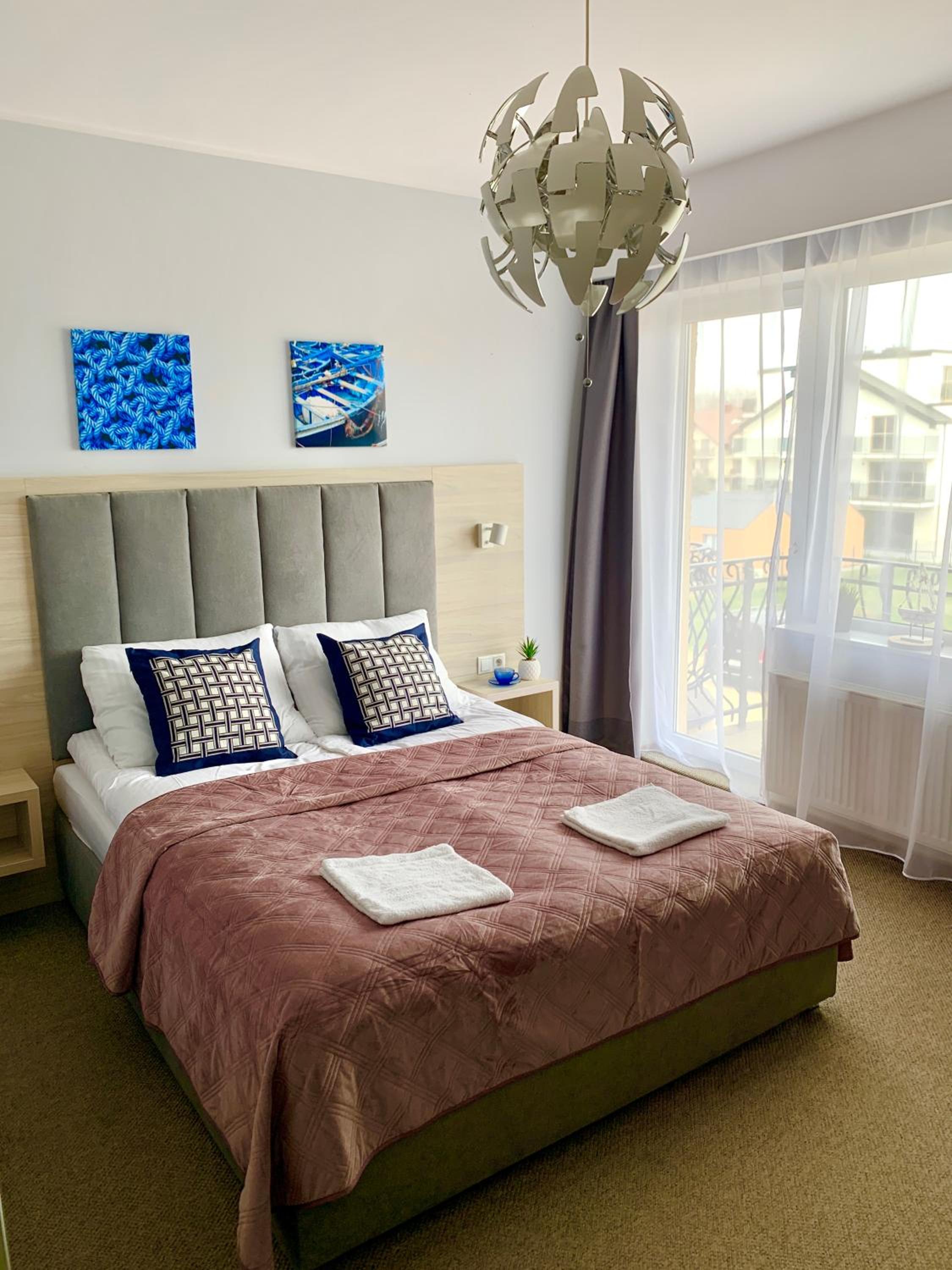Quadruple Room with Balcony - Photo 12