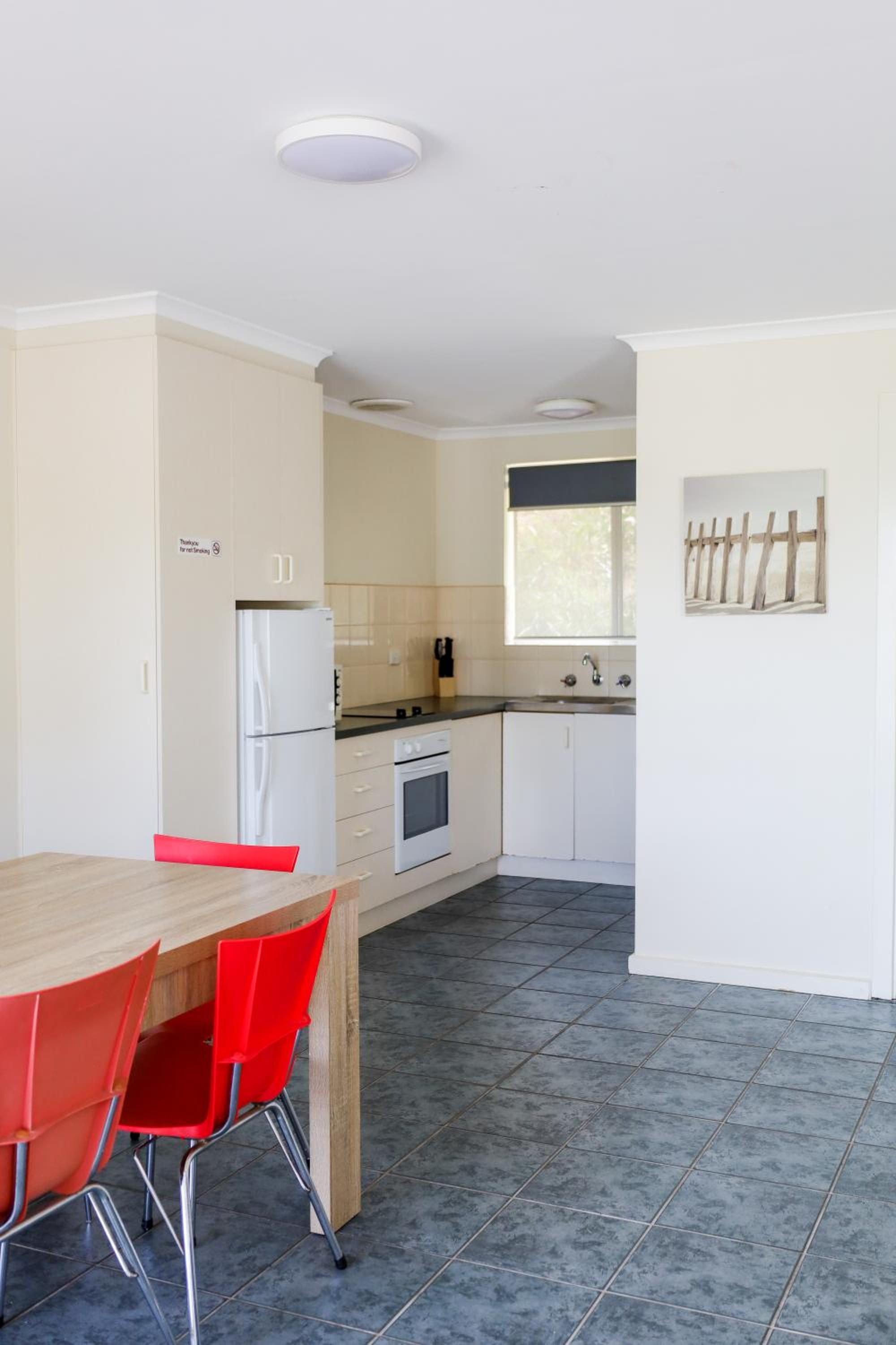Three-Bedroom Apartment - Photo 6