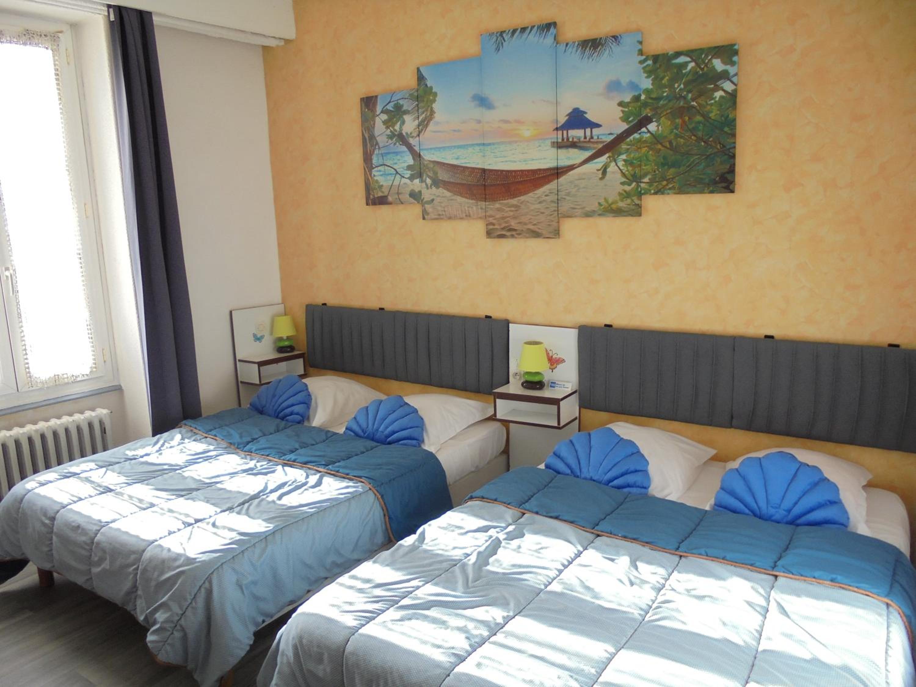 Quadruple Room with two Full Beds (2 Adults + 2 Children)