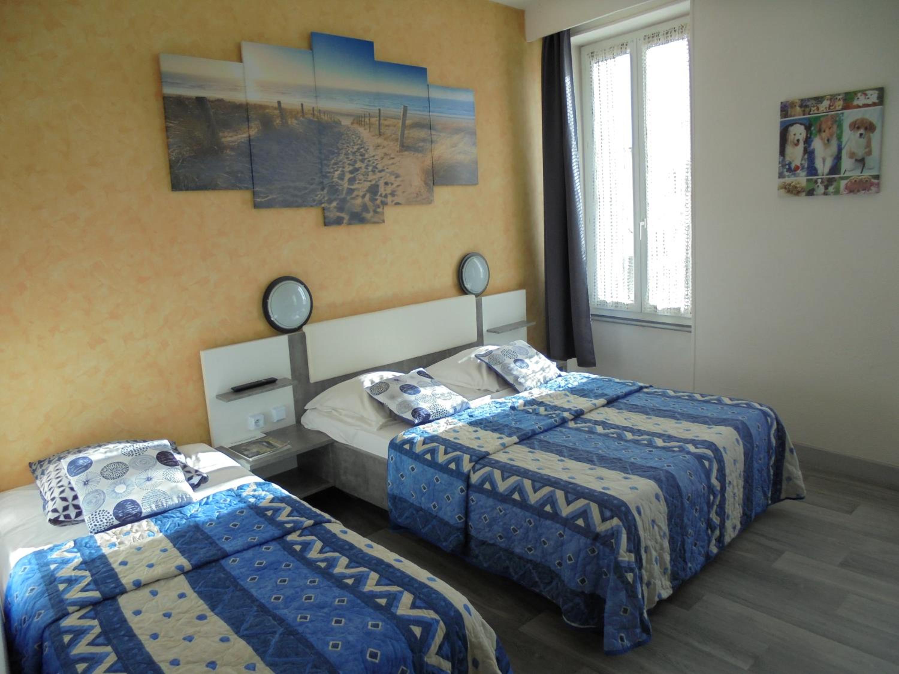 Triple Room (2 Adults + 1 Child)