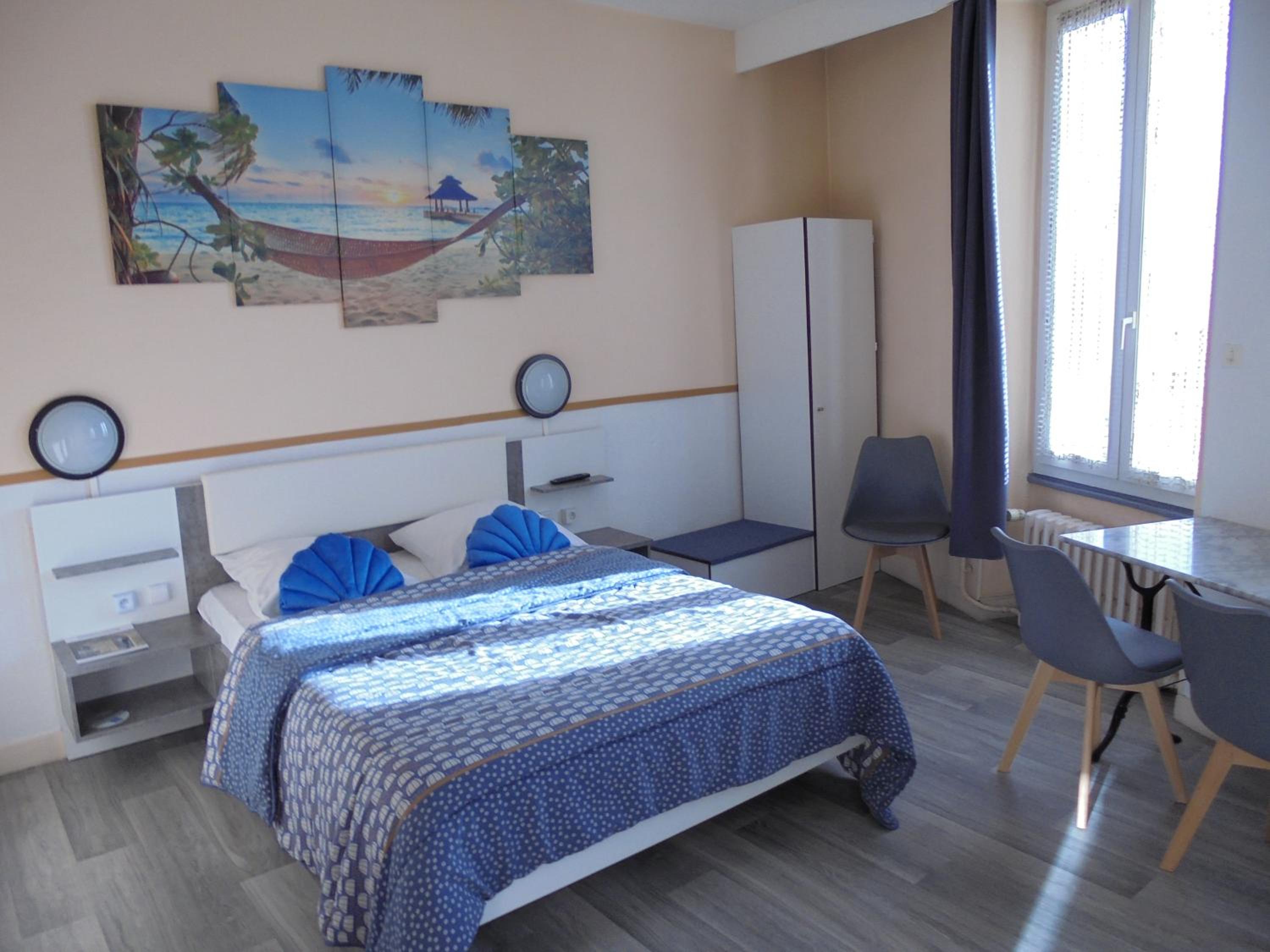 Quadruple Room with Three Beds (2 Adults + 2 Children)