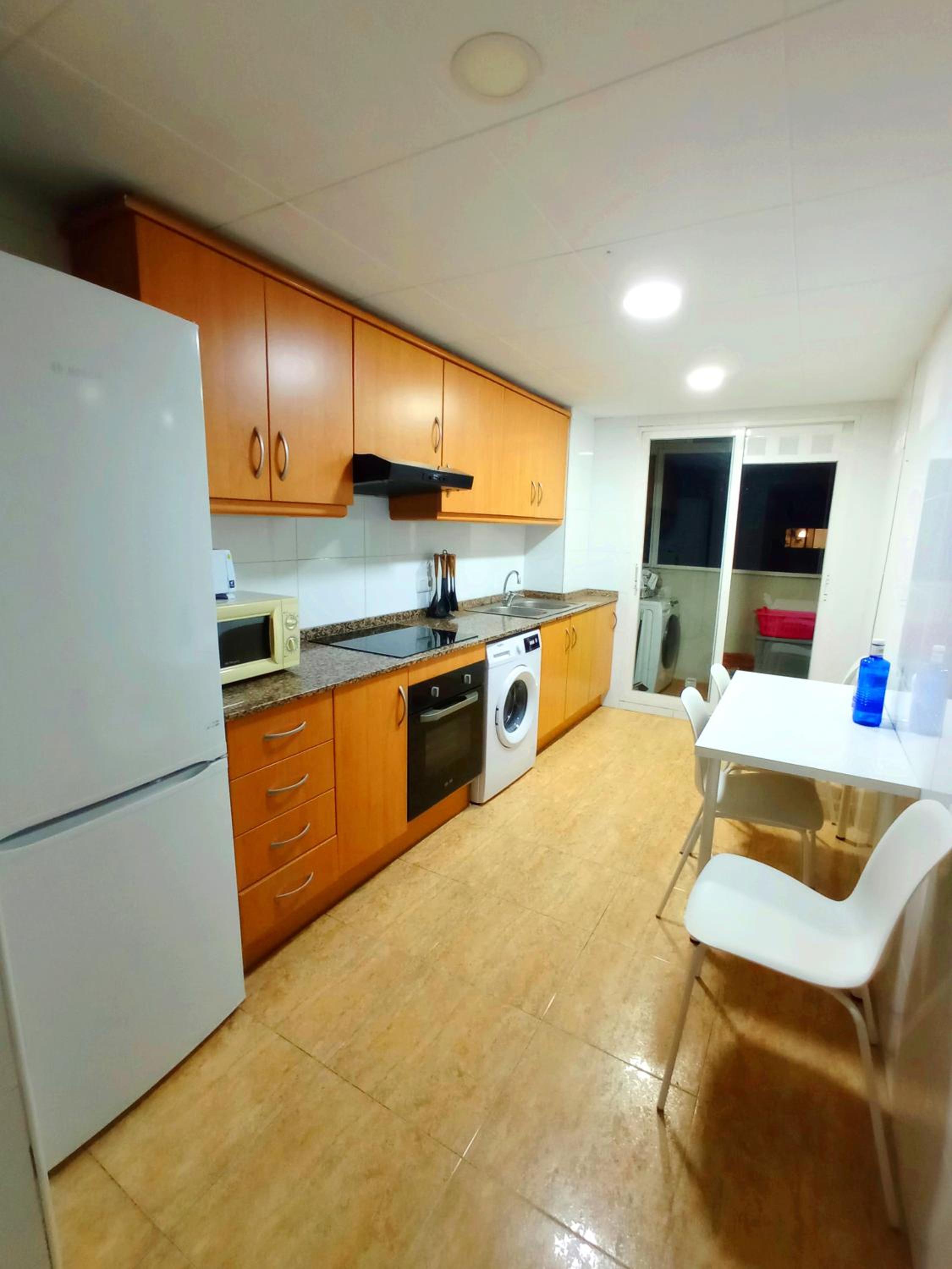 Three-Bedroom Apartment photo 2