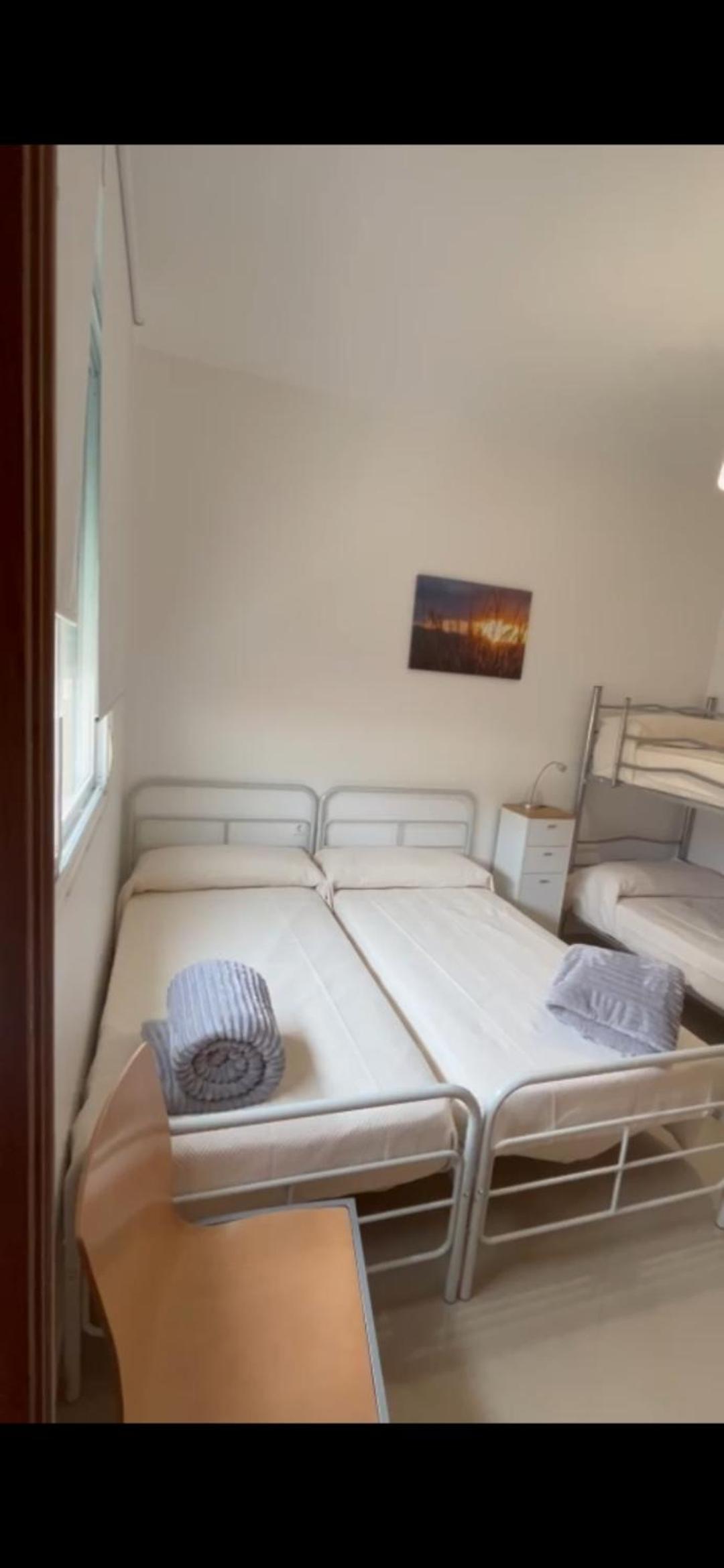 Habitación Cuádruple Económica con Baño Compartido