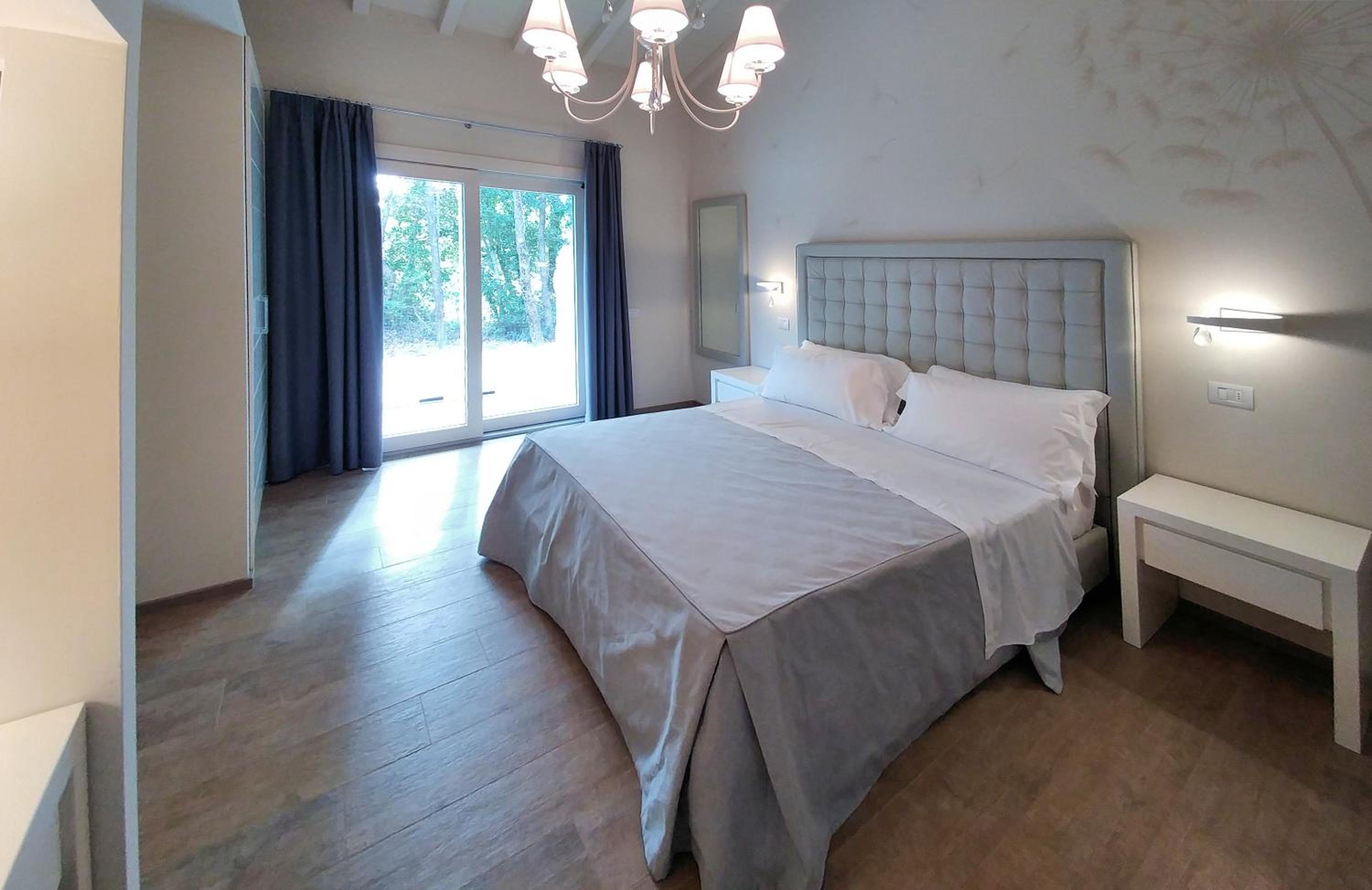 Deluxe Room - Photo 1