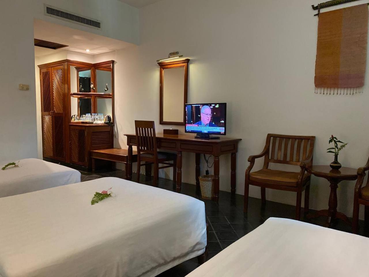 Deluxe Triple Room - Photo 7