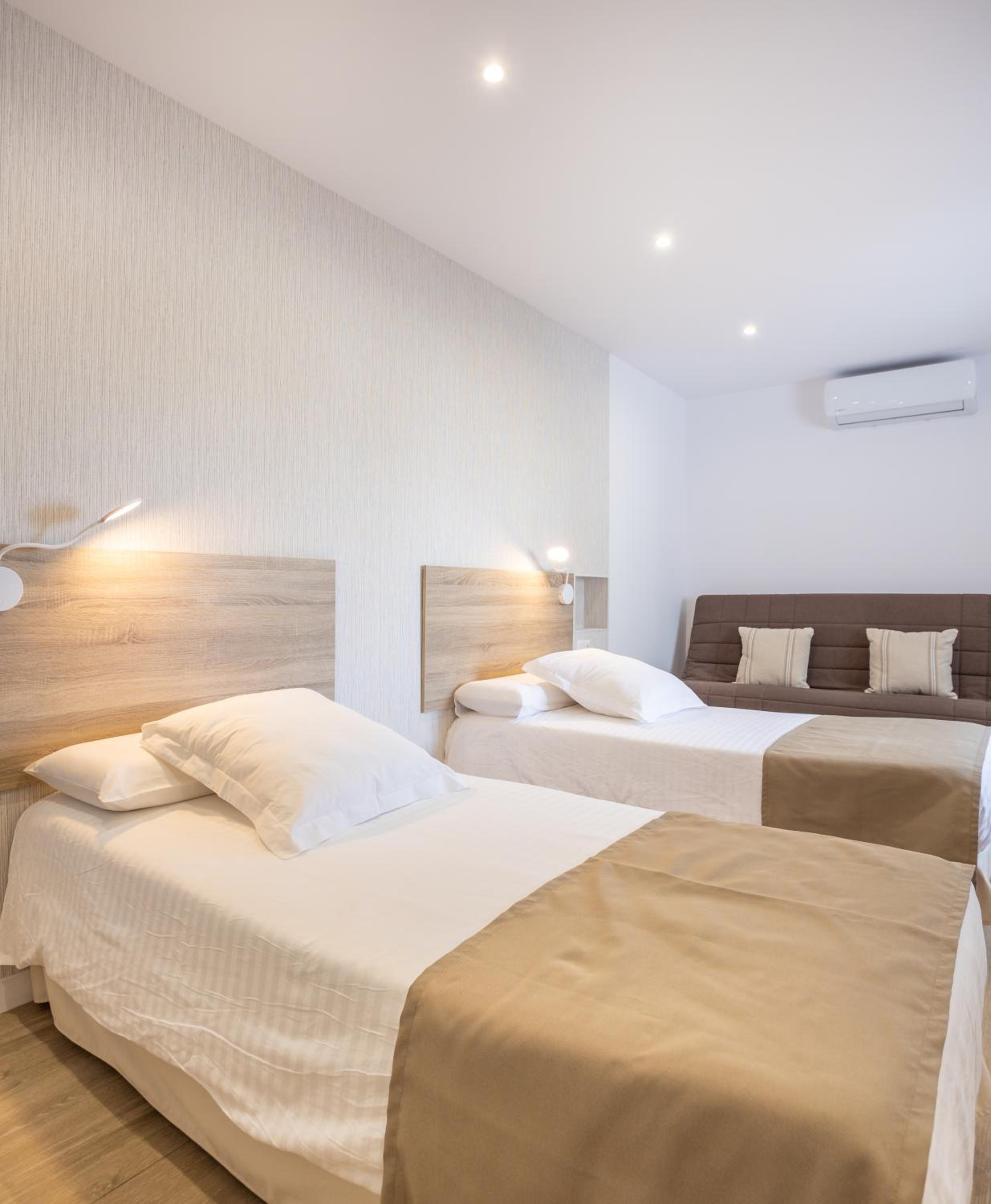 Habitación Cuádruple Confort