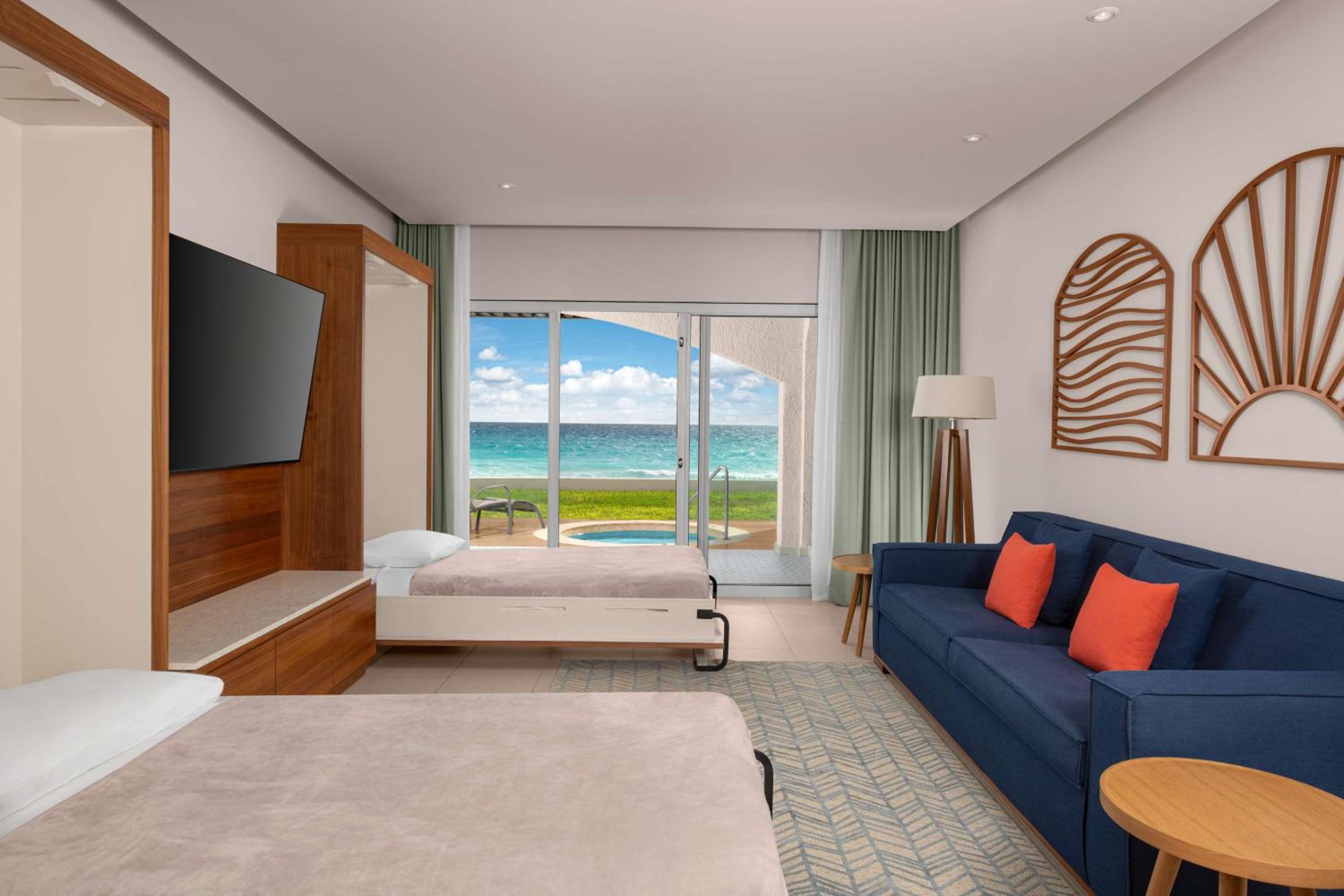Habitación Enclave frente al mar con dos camas Murphy