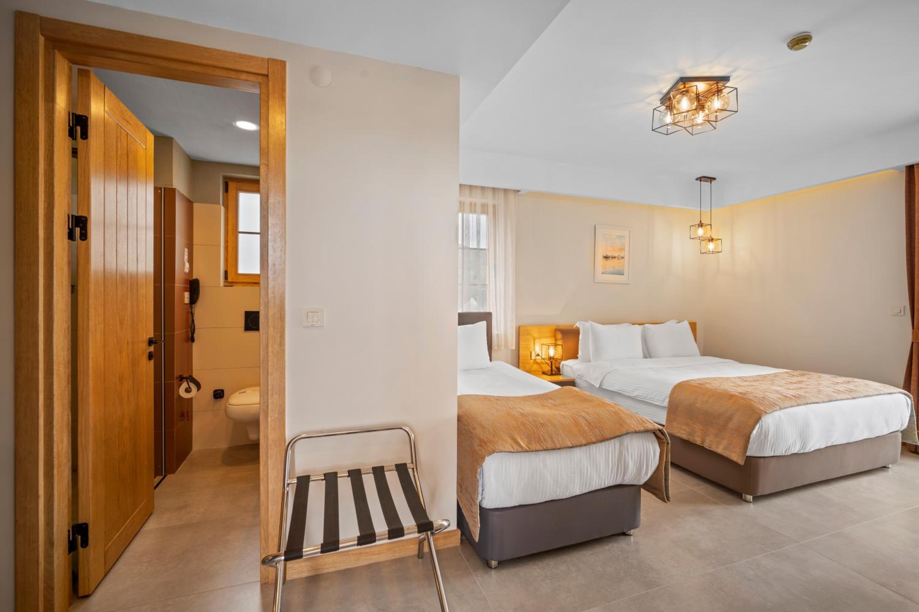 Standard Triple Room - Photo 1