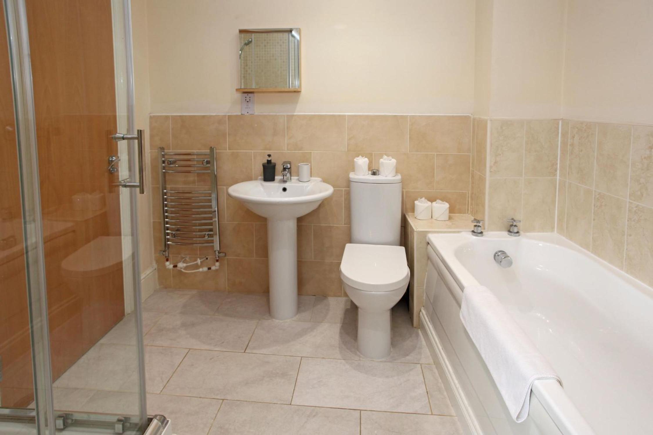 Four-Bedroom House - Photo 25
