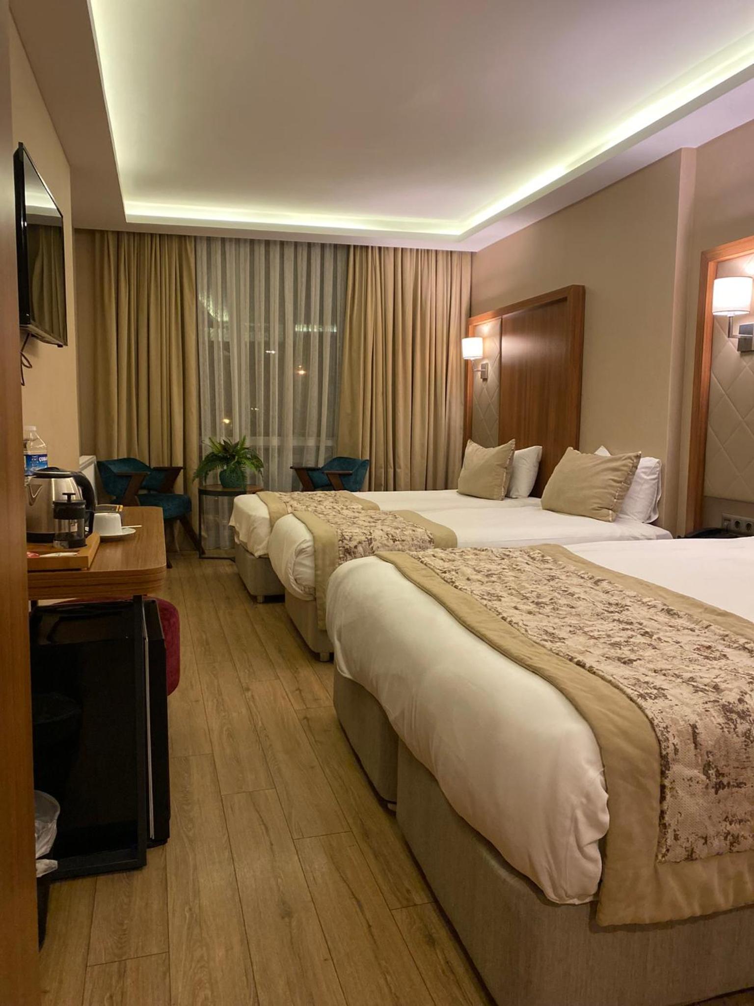 Deluxe Triple Room - Photo 1