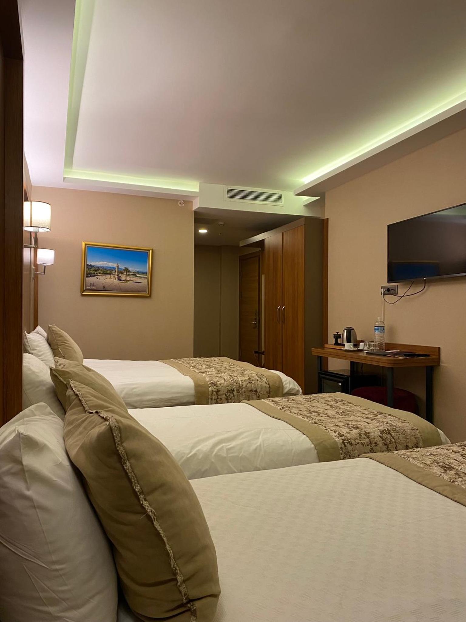Deluxe Triple Room - Photo 4