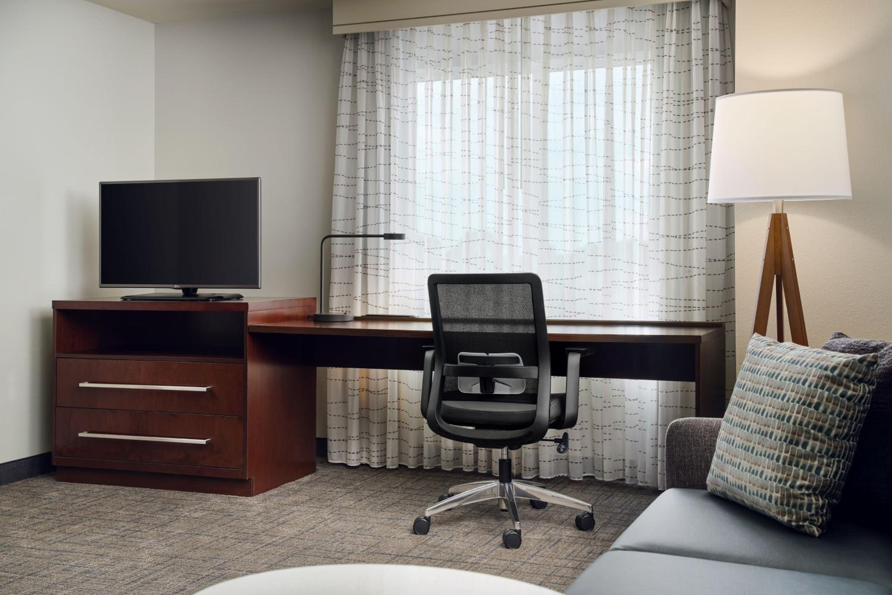 One-Bedroom King Suite with Sofa Bed and Roll-in Shower - Mobility Accessible